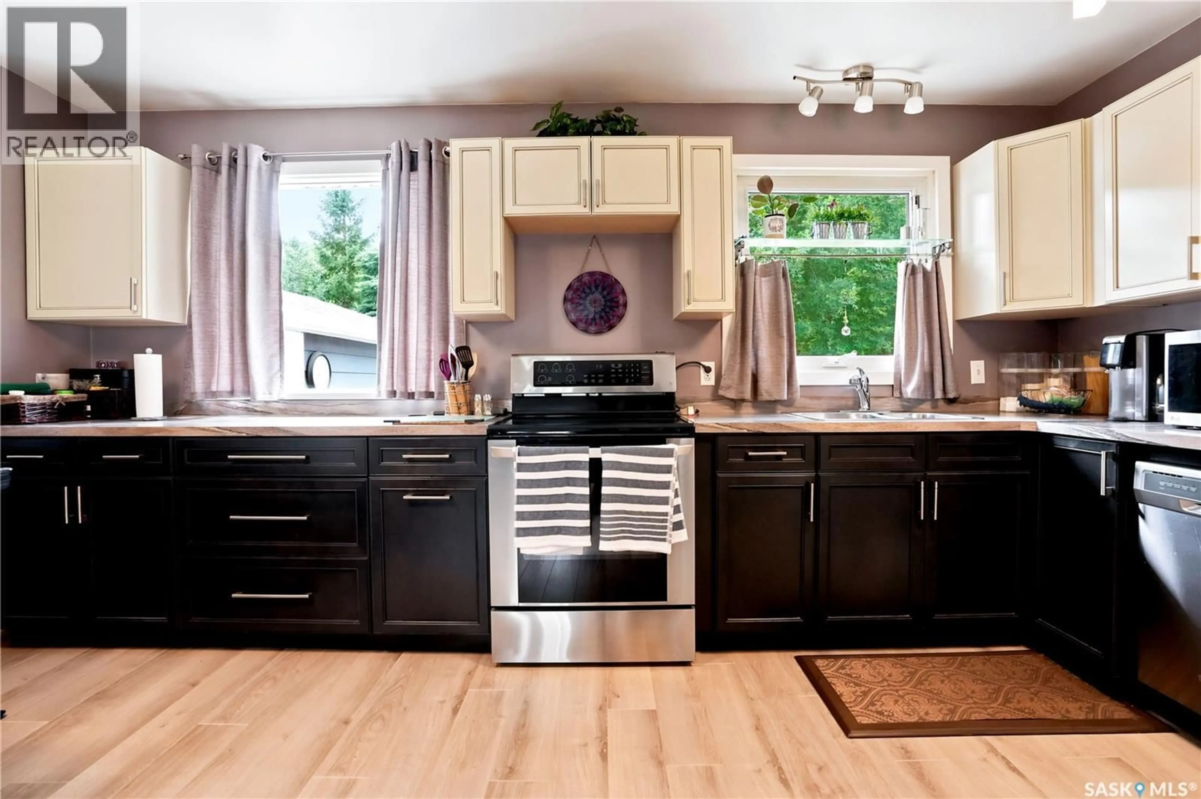 Open concept kitchen, wood/laminate floor for 450 CENTRAL AVENUE, Fort Qu'Appelle Saskatchewan S0G1S0
