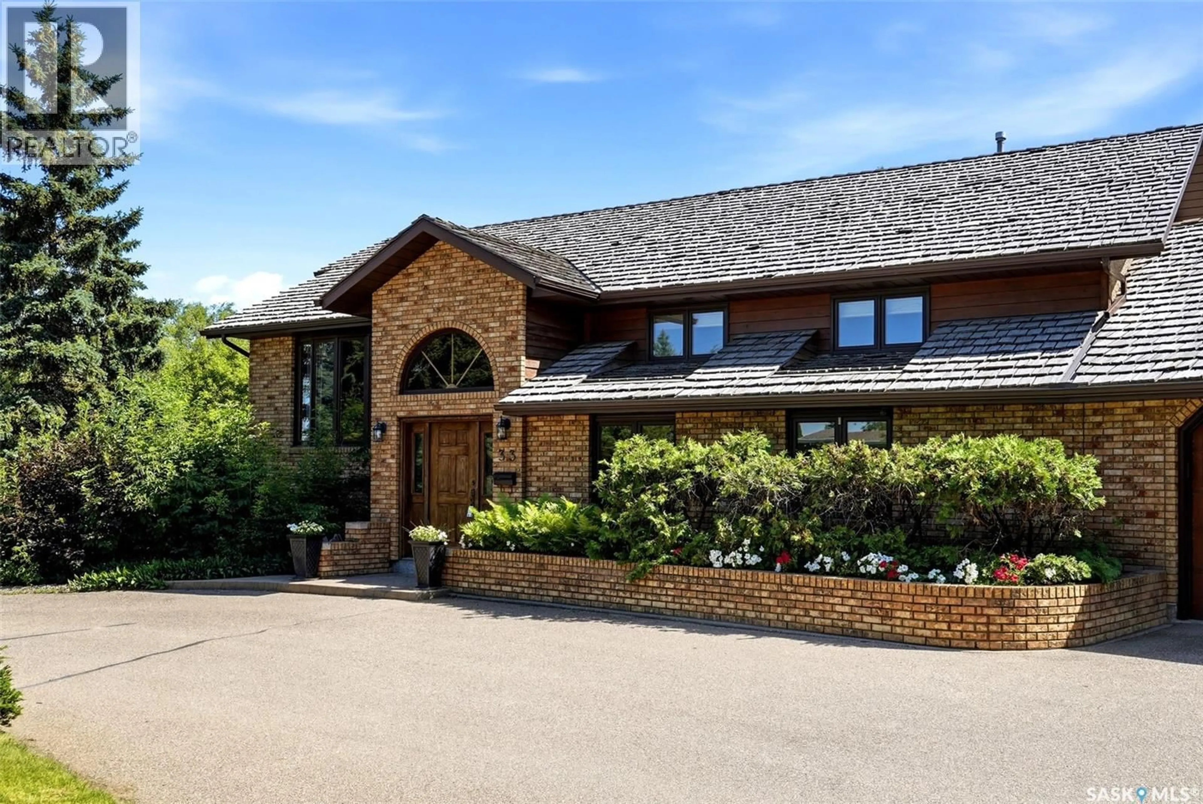 Home with brick exterior material, building for 33 FEDERAL DRIVE, White City Saskatchewan S4L5B1