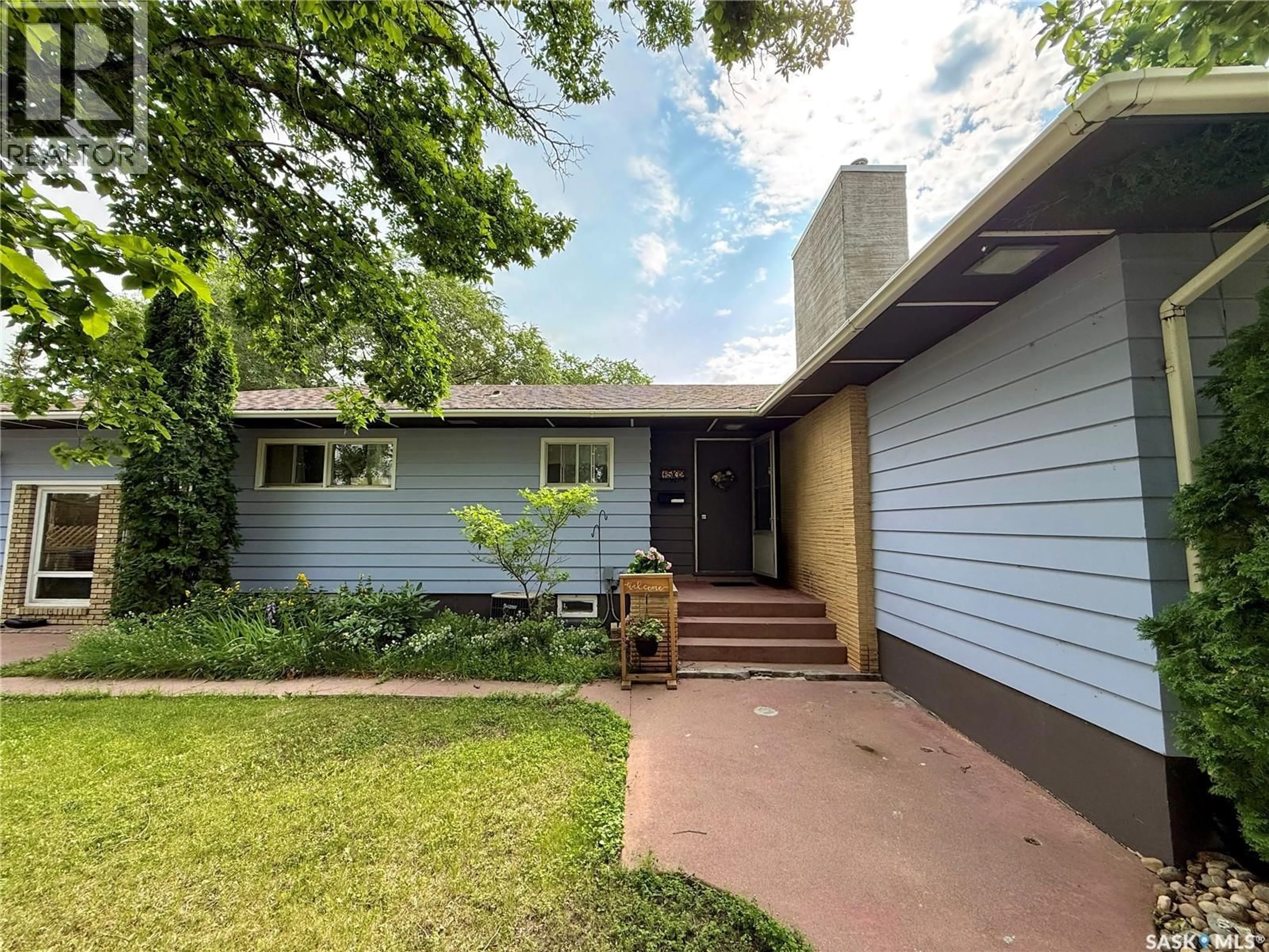 Home with vinyl exterior material, street for 1502 97TH STREET, North Battleford Saskatchewan S9A0K4