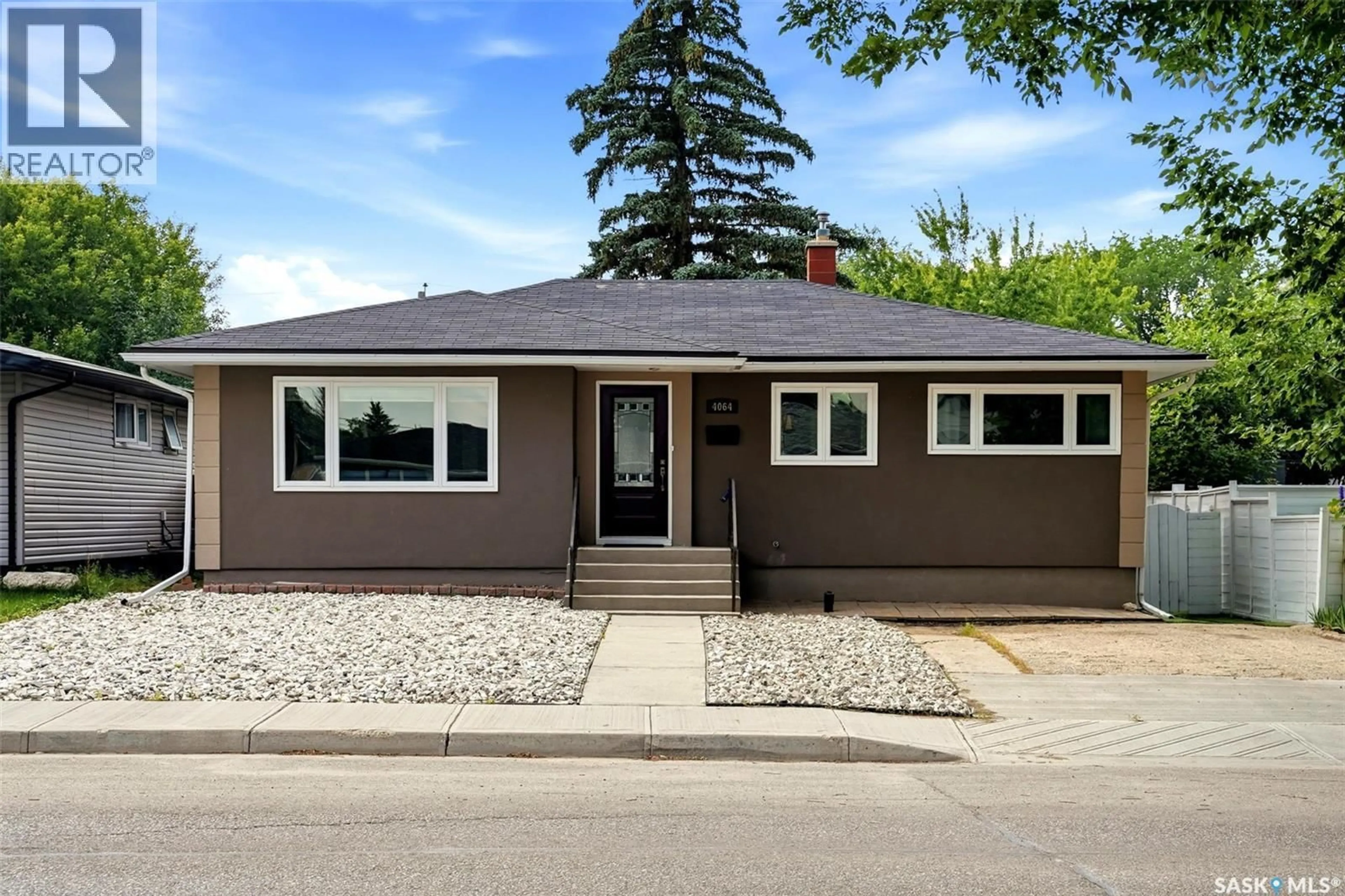 Home with vinyl exterior material, street for 4064 MONTAGUE STREET, Regina Saskatchewan S4S3K2