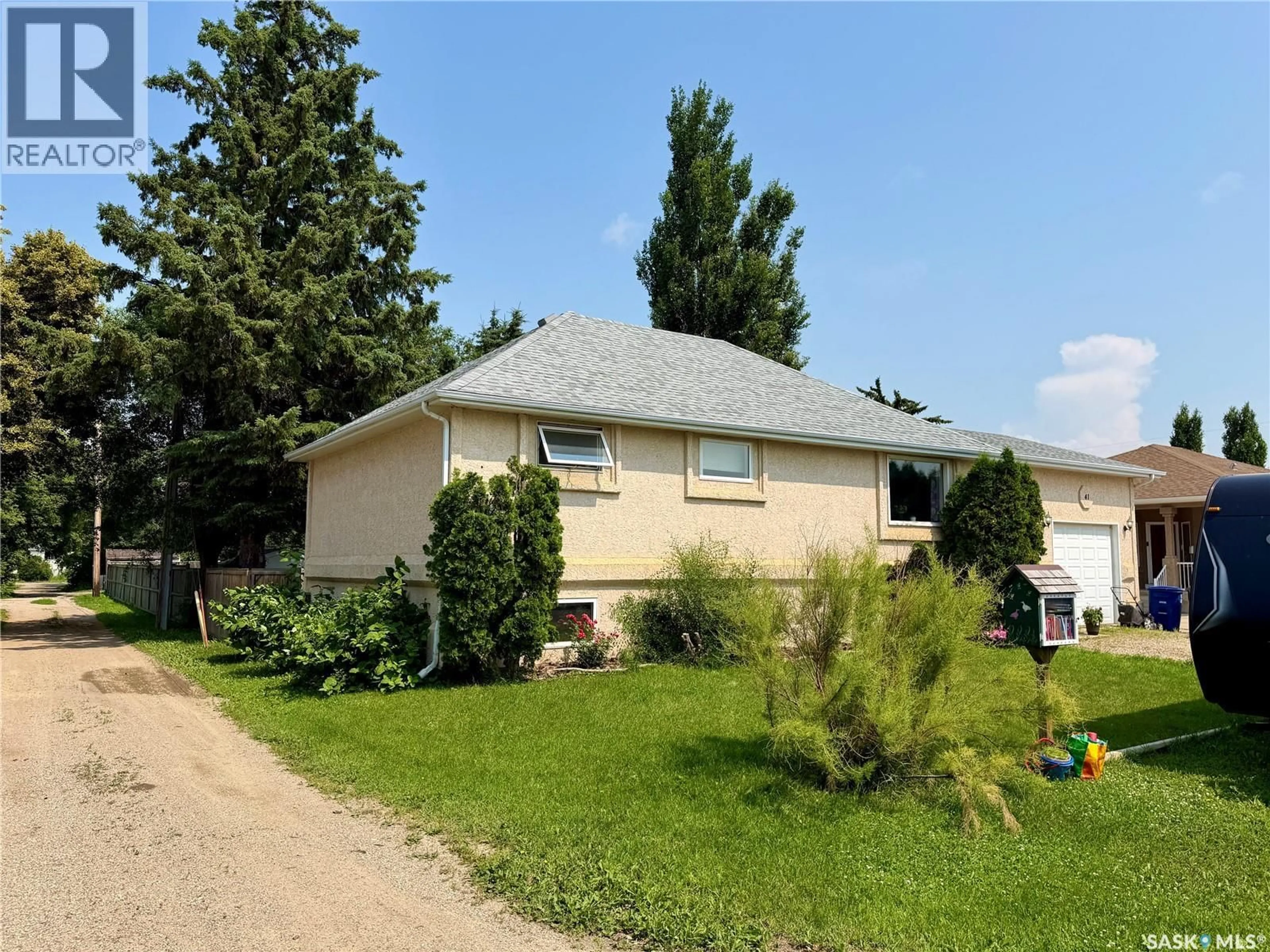 Home with vinyl exterior material, street for 41 CAMPBELL PLACE, Clavet Saskatchewan S0K0Y0
