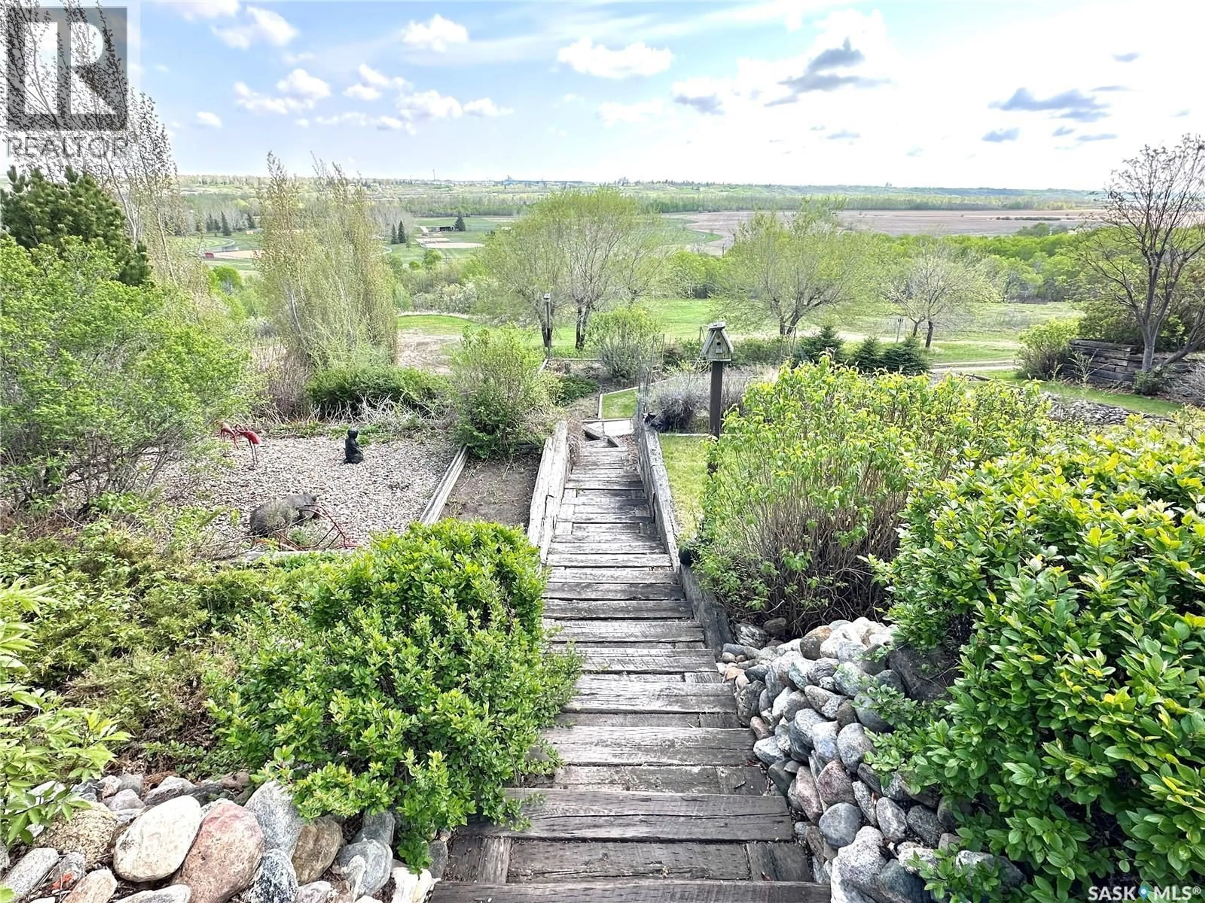 A pic from outside/outdoor area/front of a property/back of a property/a pic from drone, water/lake/river/ocean view for 9 1ST STREET, Battleford Saskatchewan S0M0E0