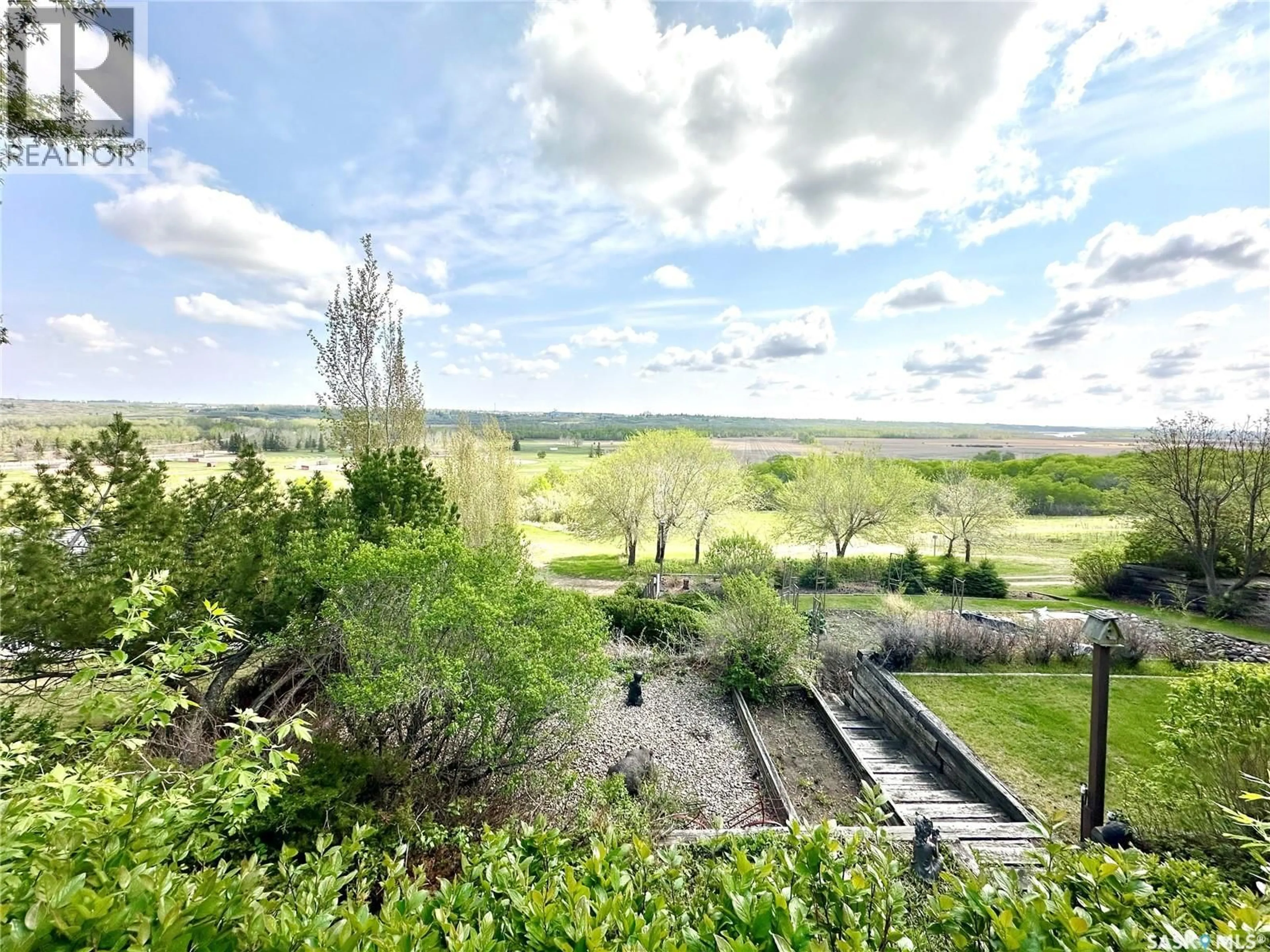 A pic from outside/outdoor area/front of a property/back of a property/a pic from drone, forest/trees view for 9 1ST STREET, Battleford Saskatchewan S0M0E0
