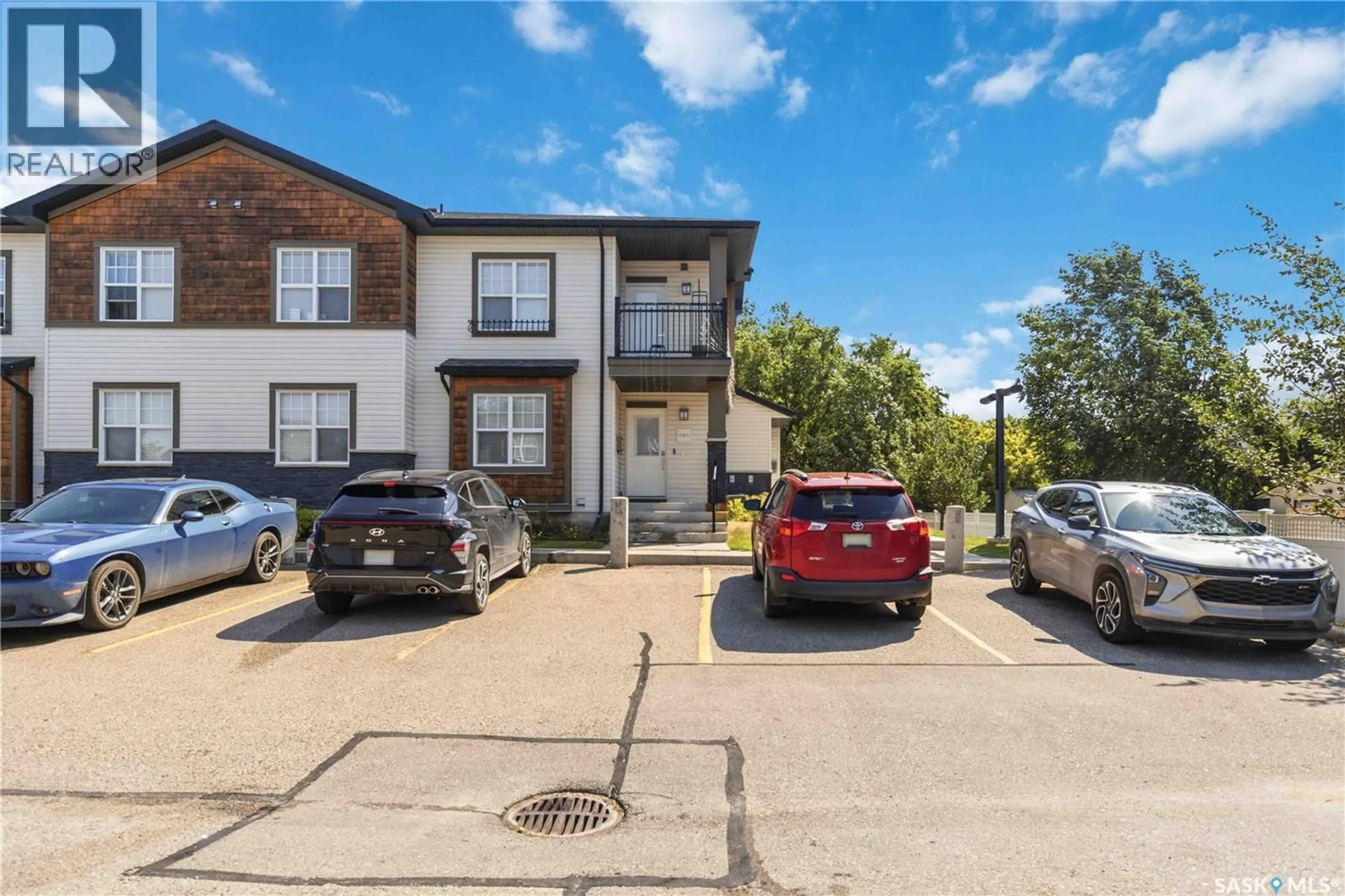 A pic from outside/outdoor area/front of a property/back of a property/a pic from drone, street for 2315 - 121 MCCLOCKLIN ROAD, Saskatoon Saskatchewan S7R0K8