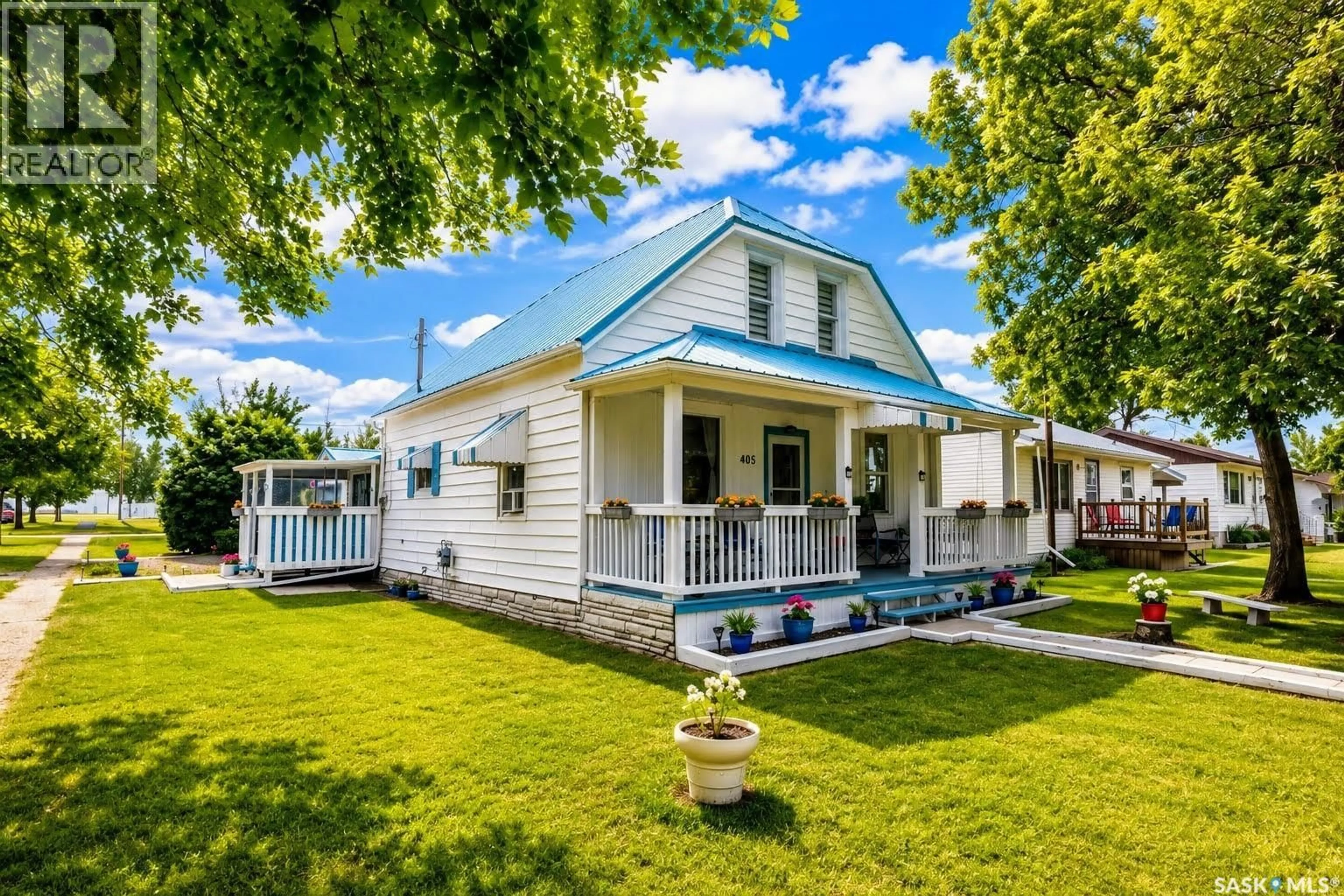 Home with vinyl exterior material, street for 405 SASKATCHEWAN STREET, Central Butte Saskatchewan S0H0T0
