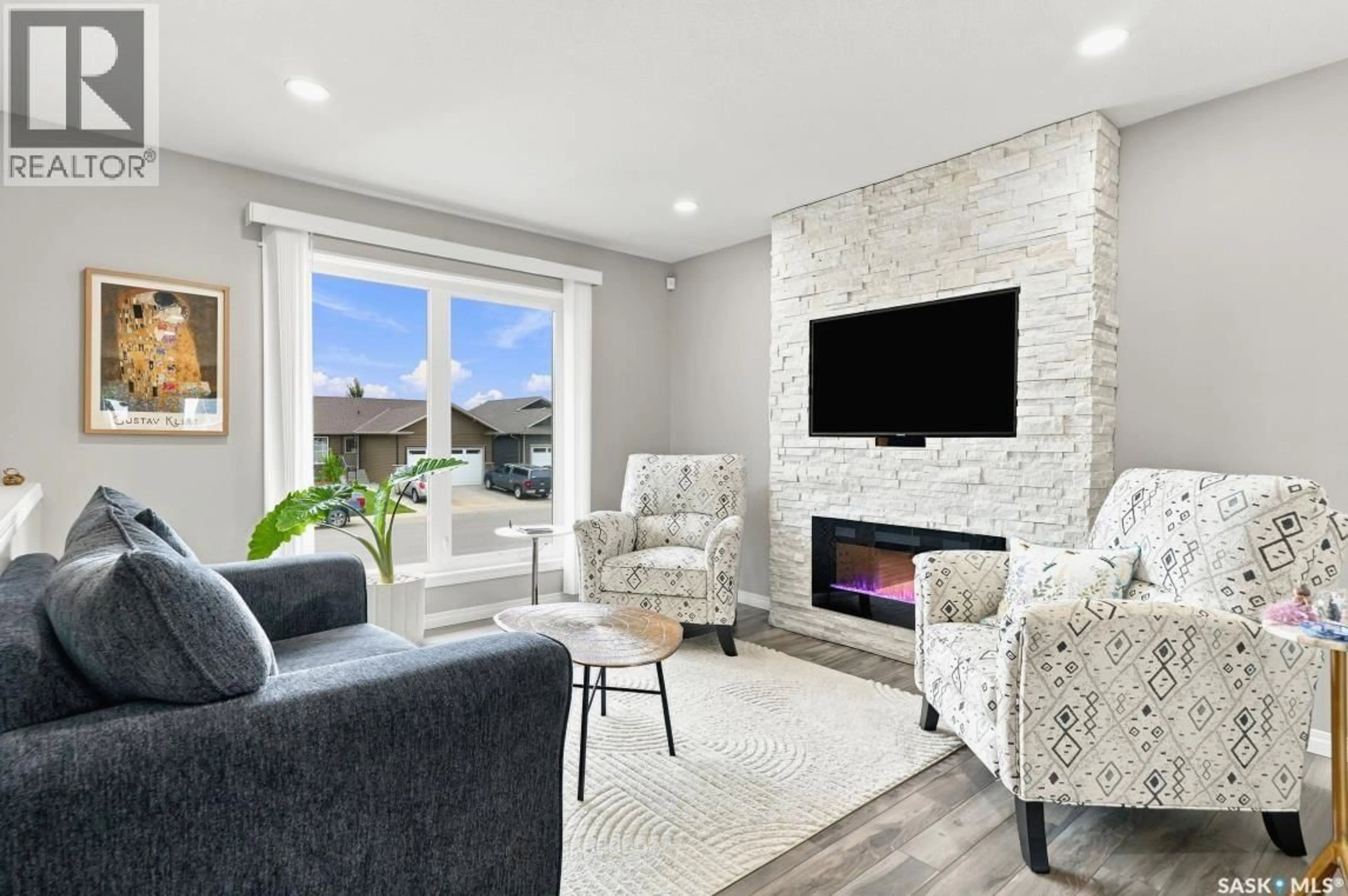 Living room with furniture, unknown for 857 REIMER ROAD, Martensville Saskatchewan S0K0A2