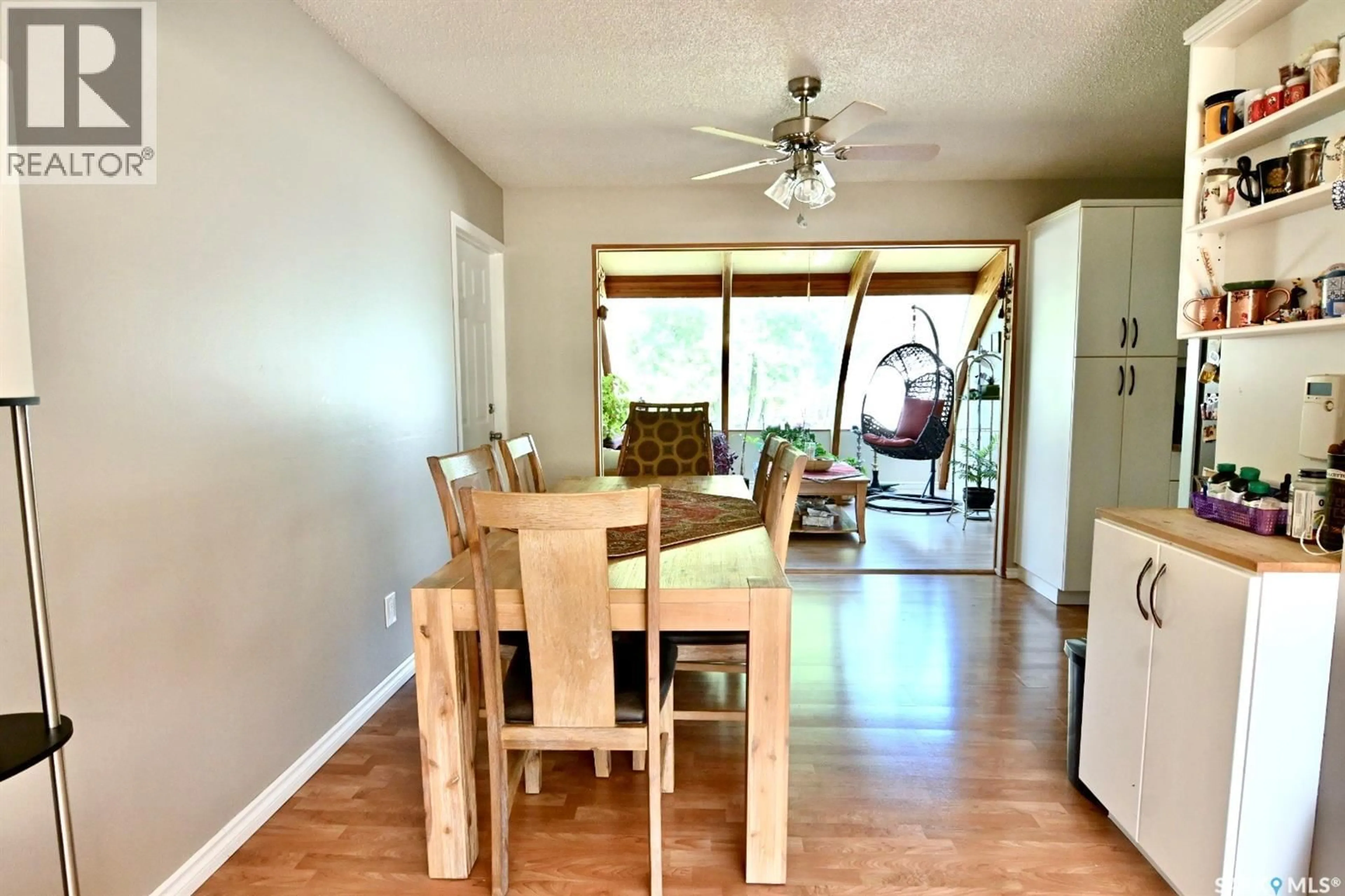 Dining room, wood/laminate floor for 521 GUELPH CRESCENT, Saskatoon Saskatchewan S7H4R3
