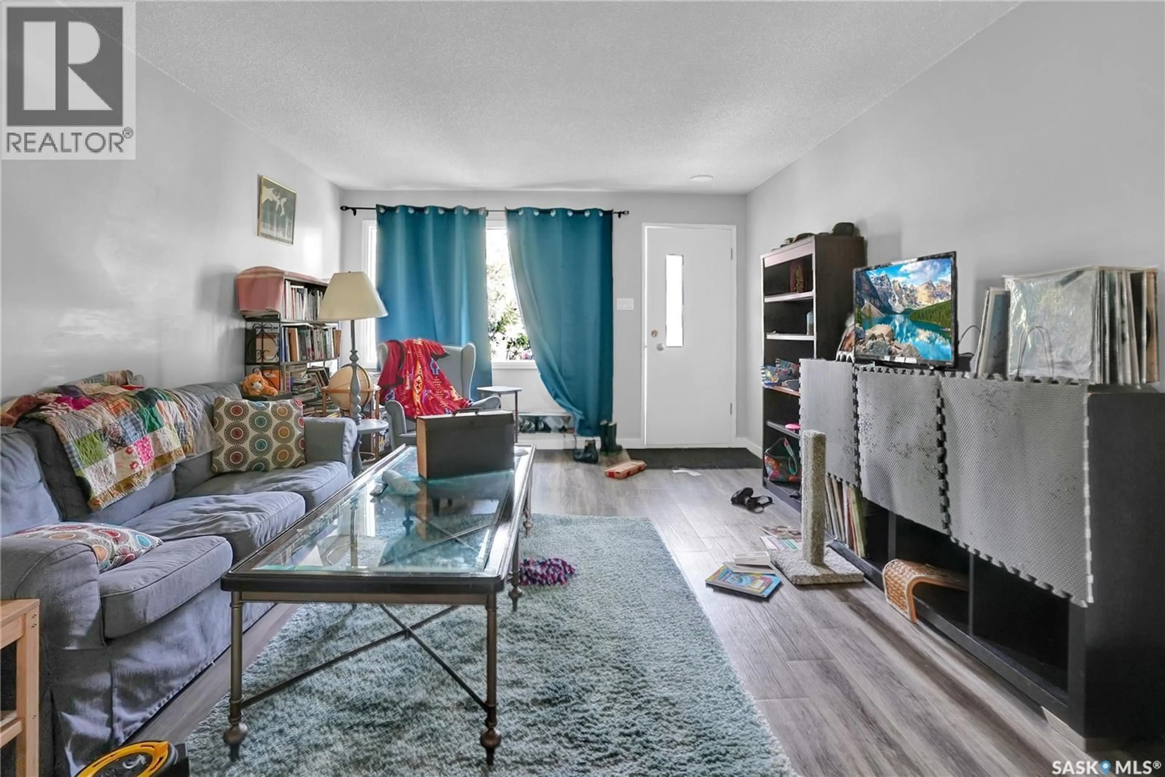 Living room with furniture, unknown for 913-915 HOCHELAGA STREET, Moose Jaw Saskatchewan S6H2H7