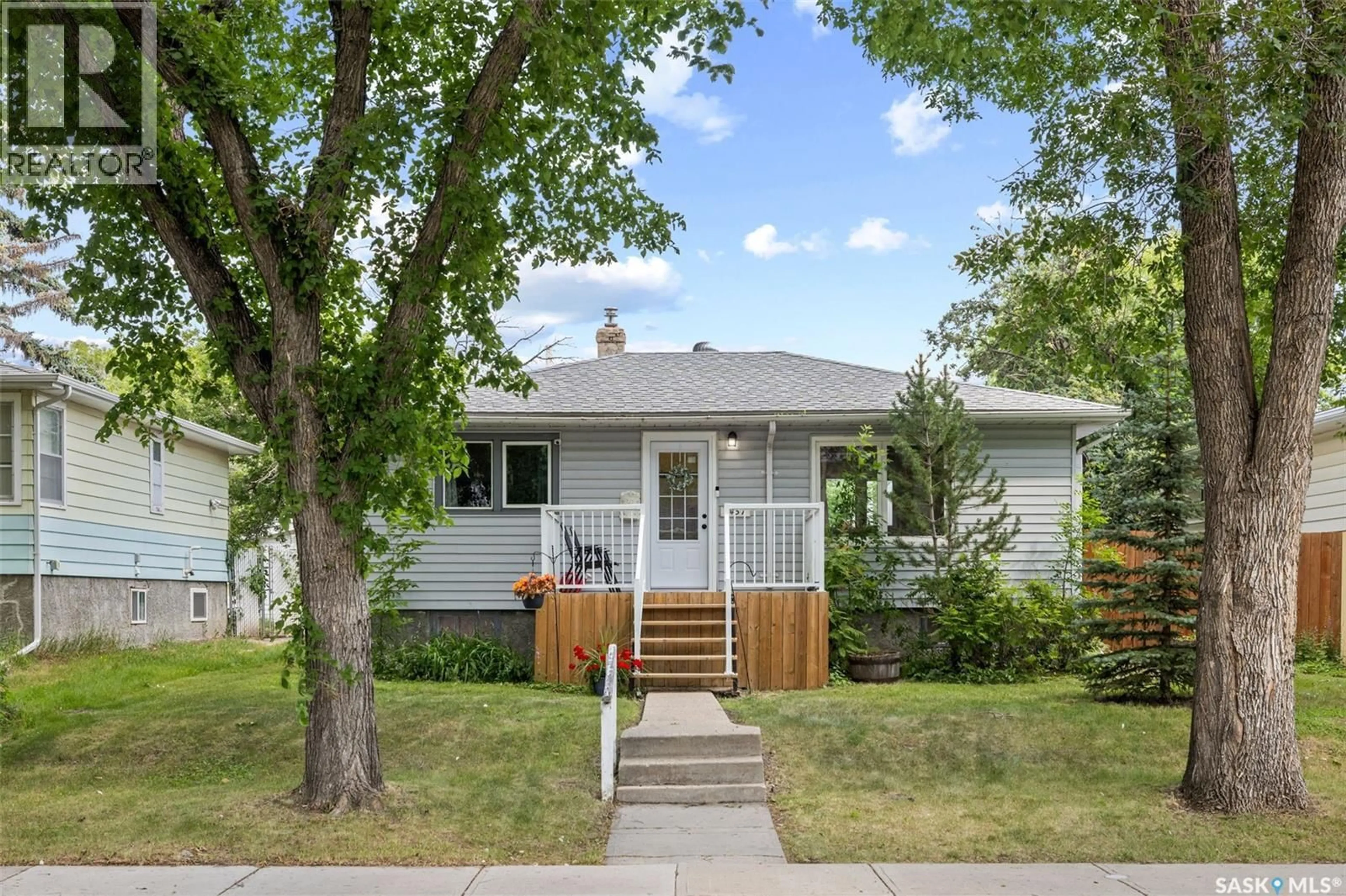 Home with vinyl exterior material, street for 2457 MACKAY STREET, Regina Saskatchewan S4N2T4