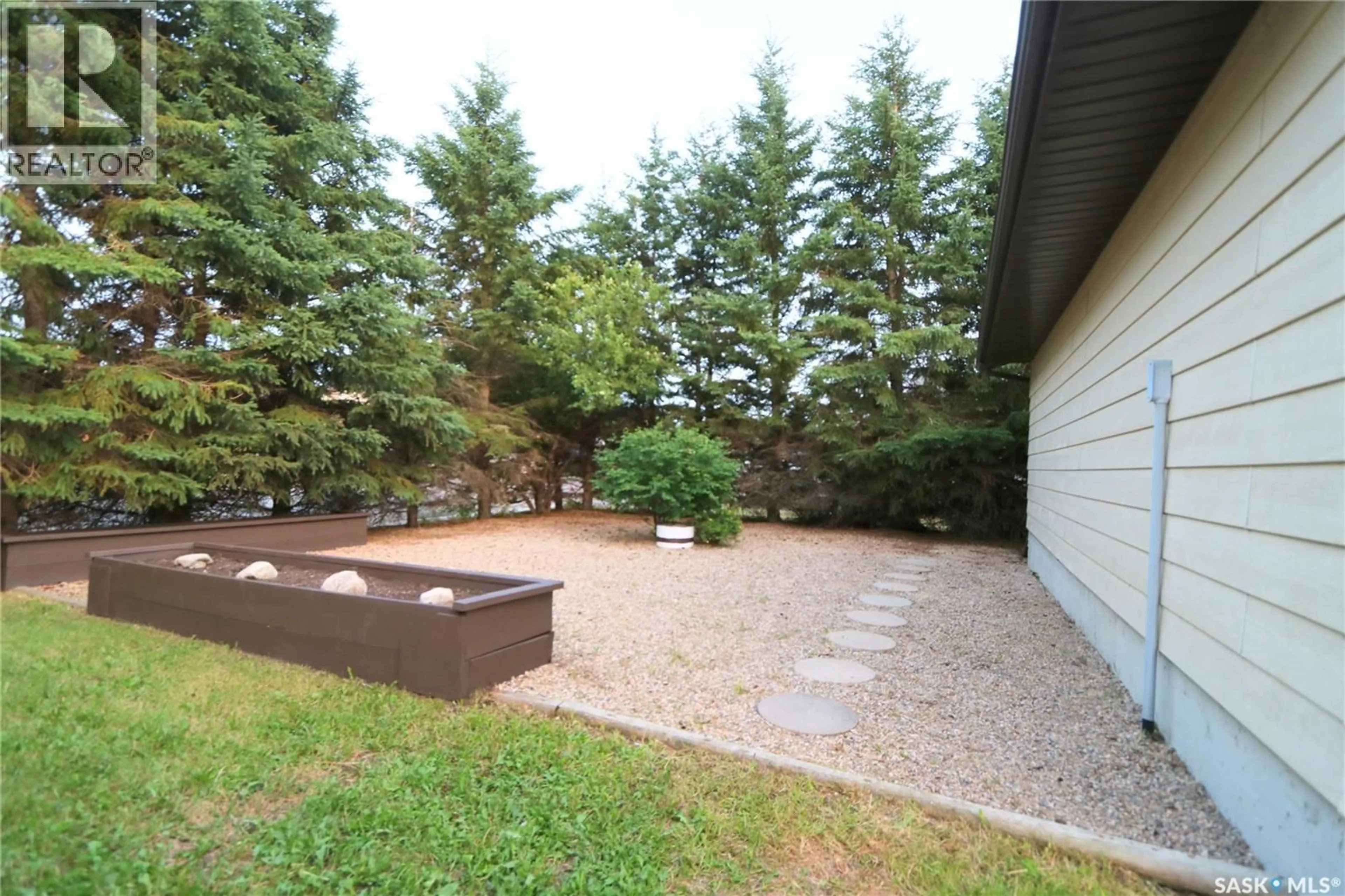 Patio, forest/trees view for 2 SPICE DRIVE, Yorkton Saskatchewan S3N3W2
