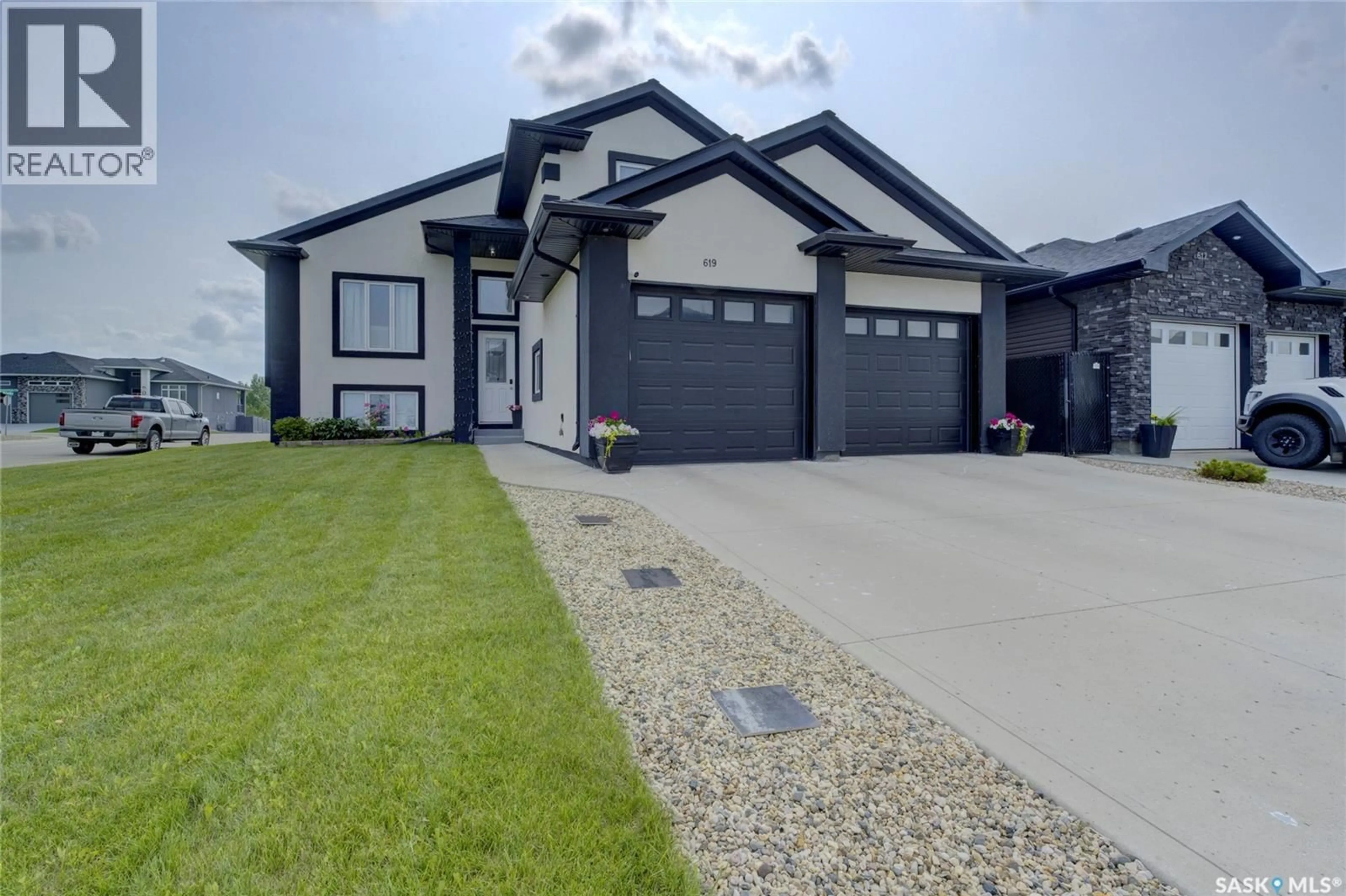 Home with vinyl exterior material, street for 619 MAPLE CRESCENT, Warman Saskatchewan S0K4S0