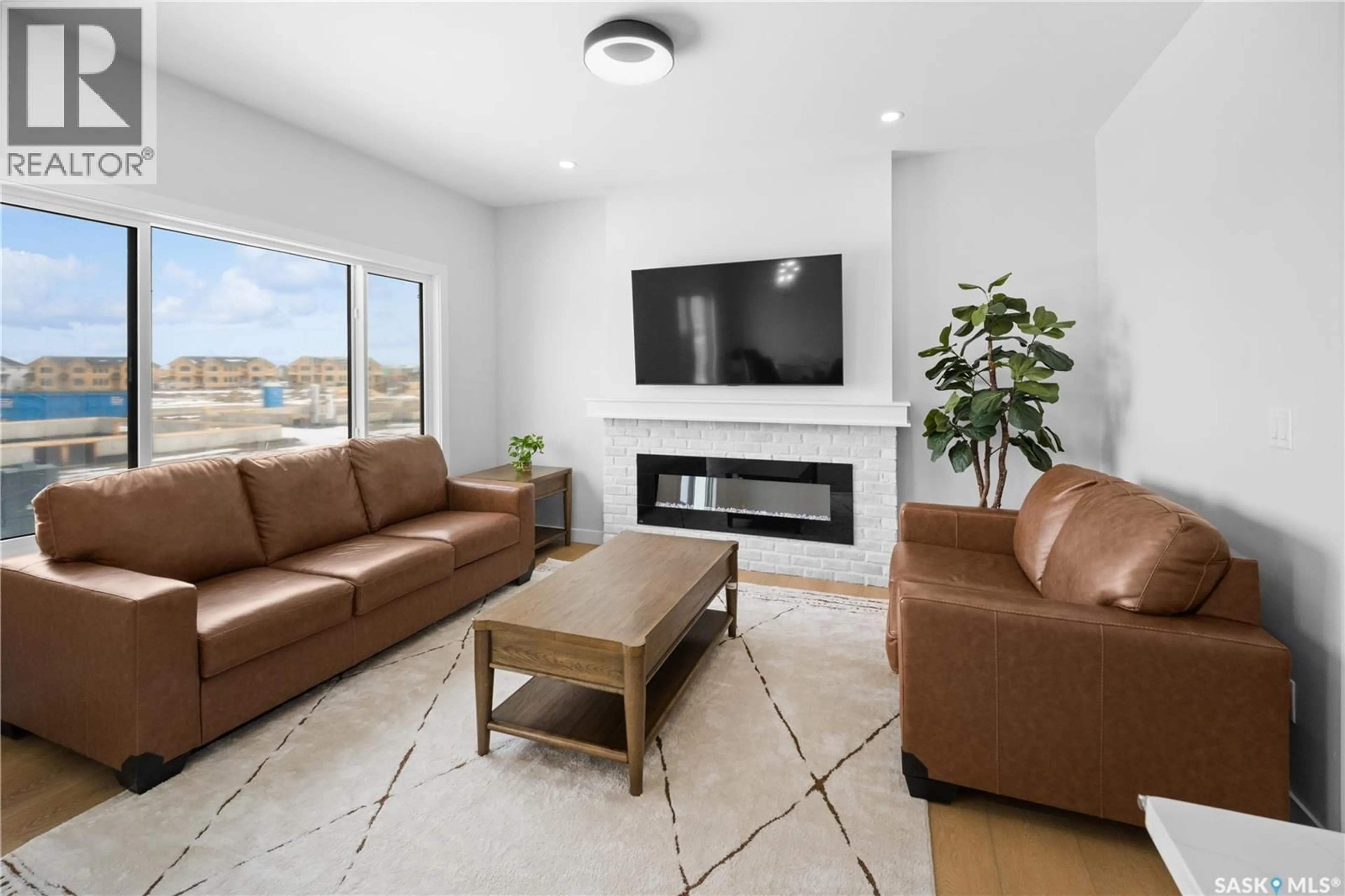 Living room with furniture, unknown for 243 LESKIW LANE, Saskatoon Saskatchewan S7V2A6