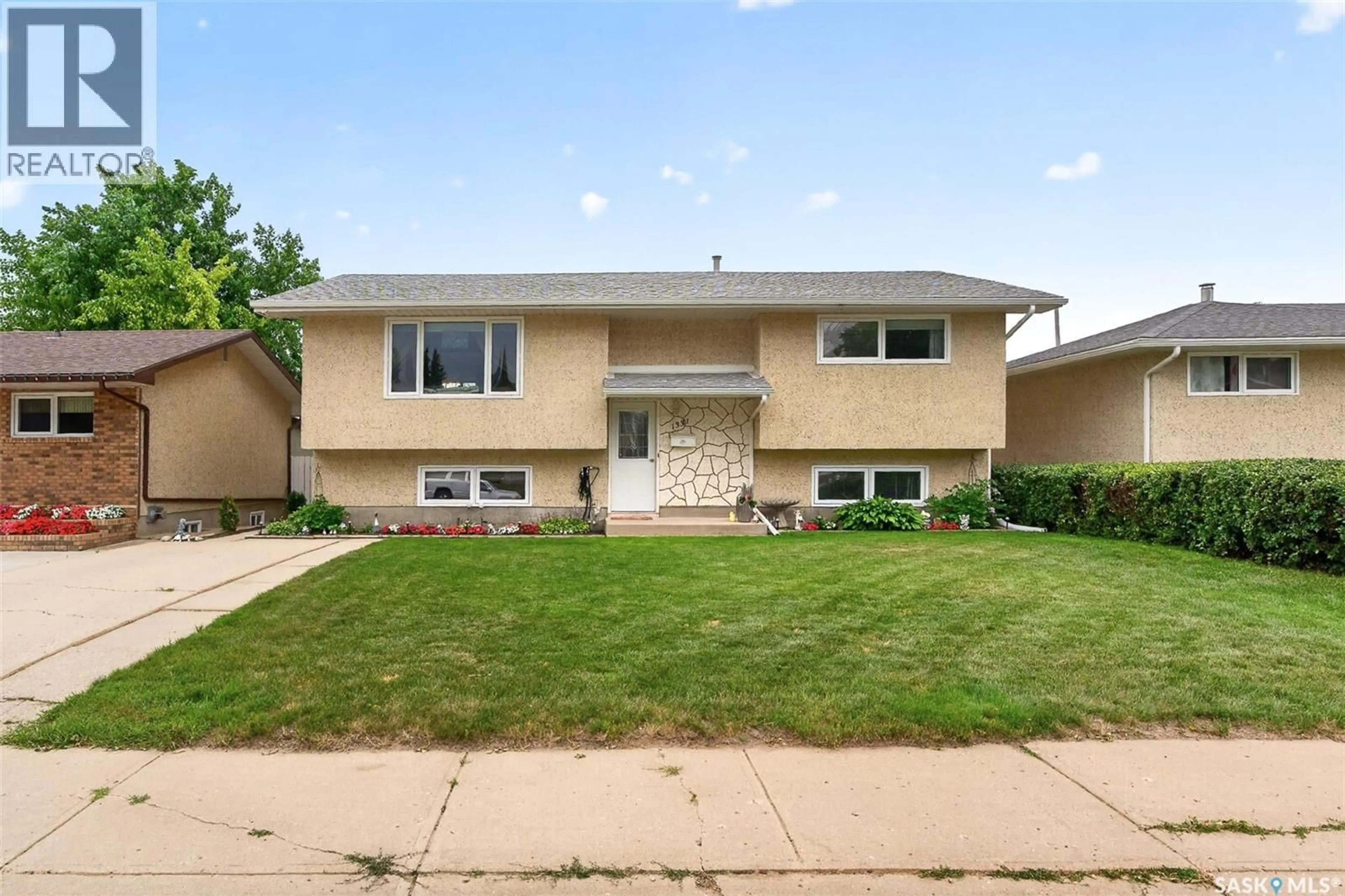 Home with vinyl exterior material, street for 1331 ATHABASCA STREET, Moose Jaw Saskatchewan S6H6C8