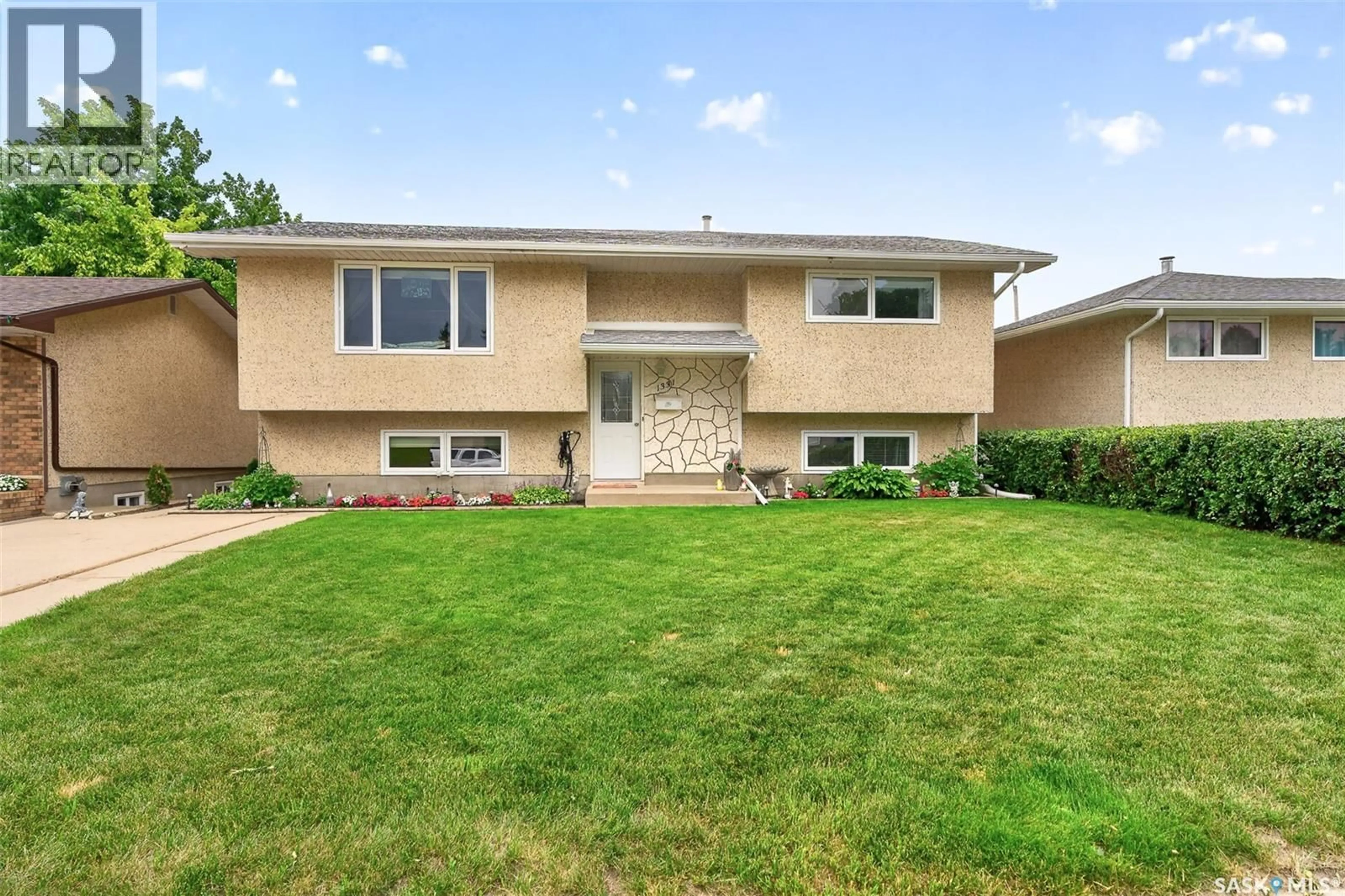 Home with vinyl exterior material, street for 1331 ATHABASCA STREET, Moose Jaw Saskatchewan S6H6C8