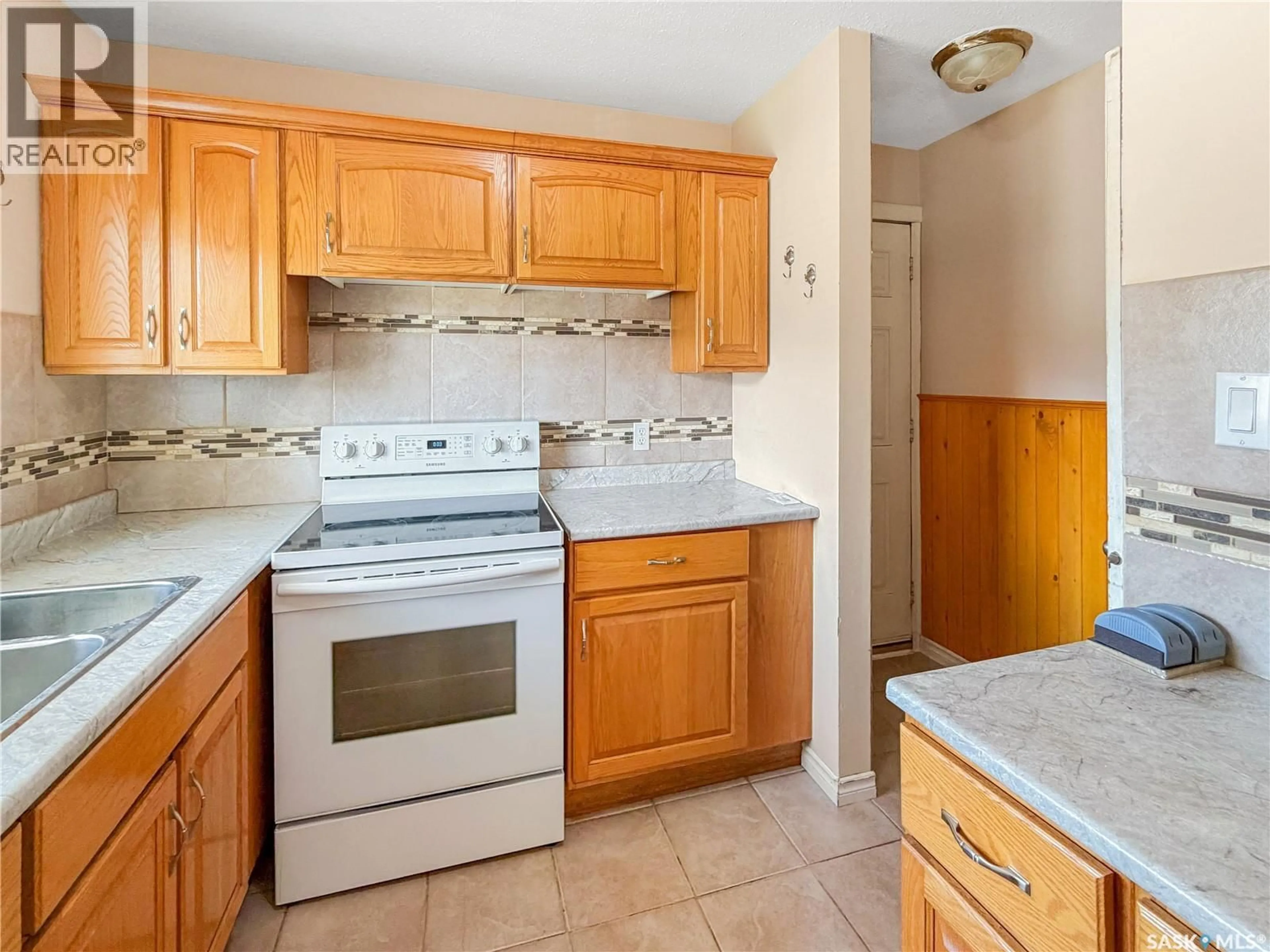 Standard kitchen, ceramic/tile floor for 1982 13TH STREET, Prince Albert Saskatchewan S6V3K5