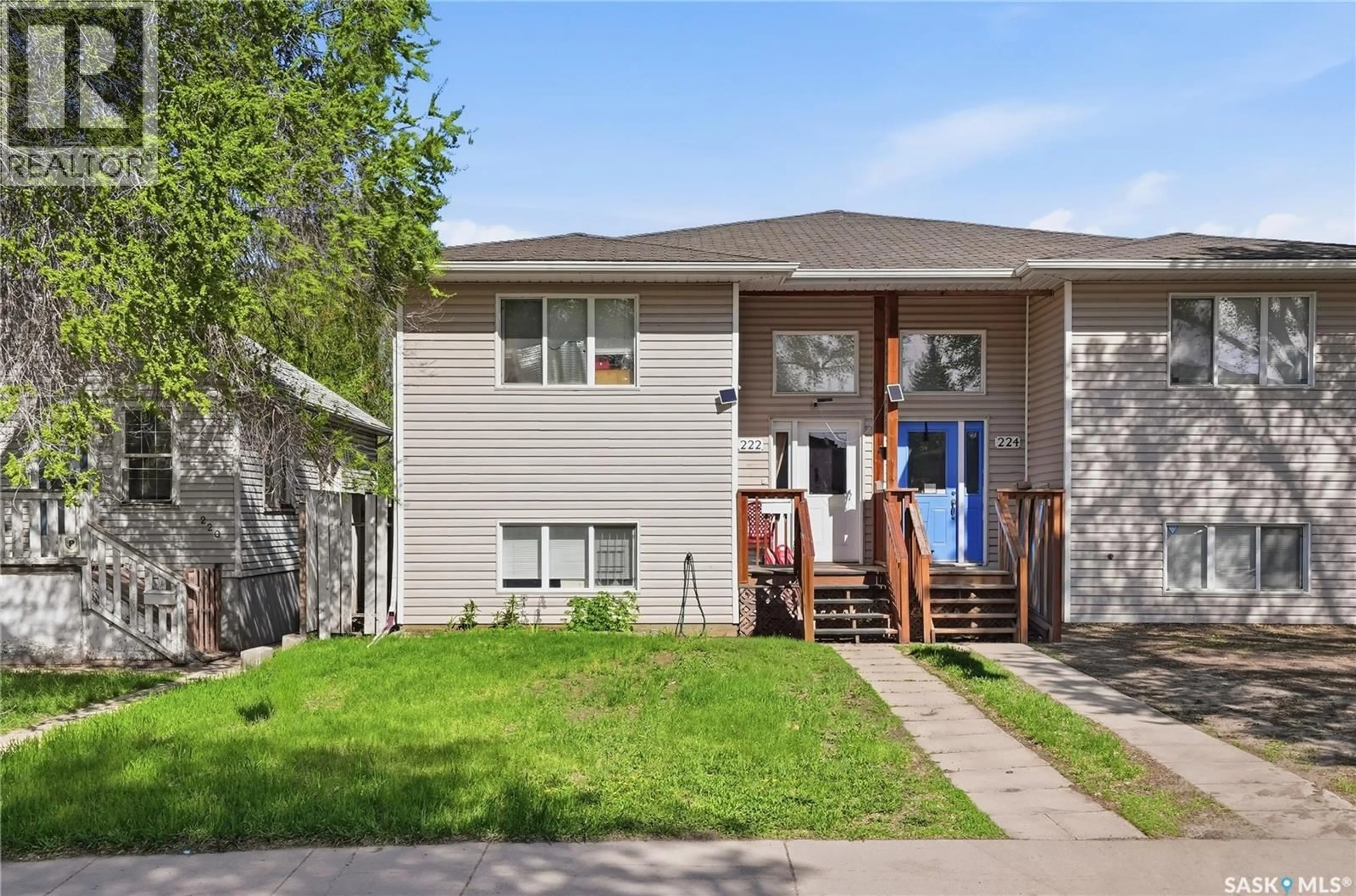 Home with vinyl exterior material, street for 222 V AVENUE, Saskatoon Saskatchewan S7M3B3