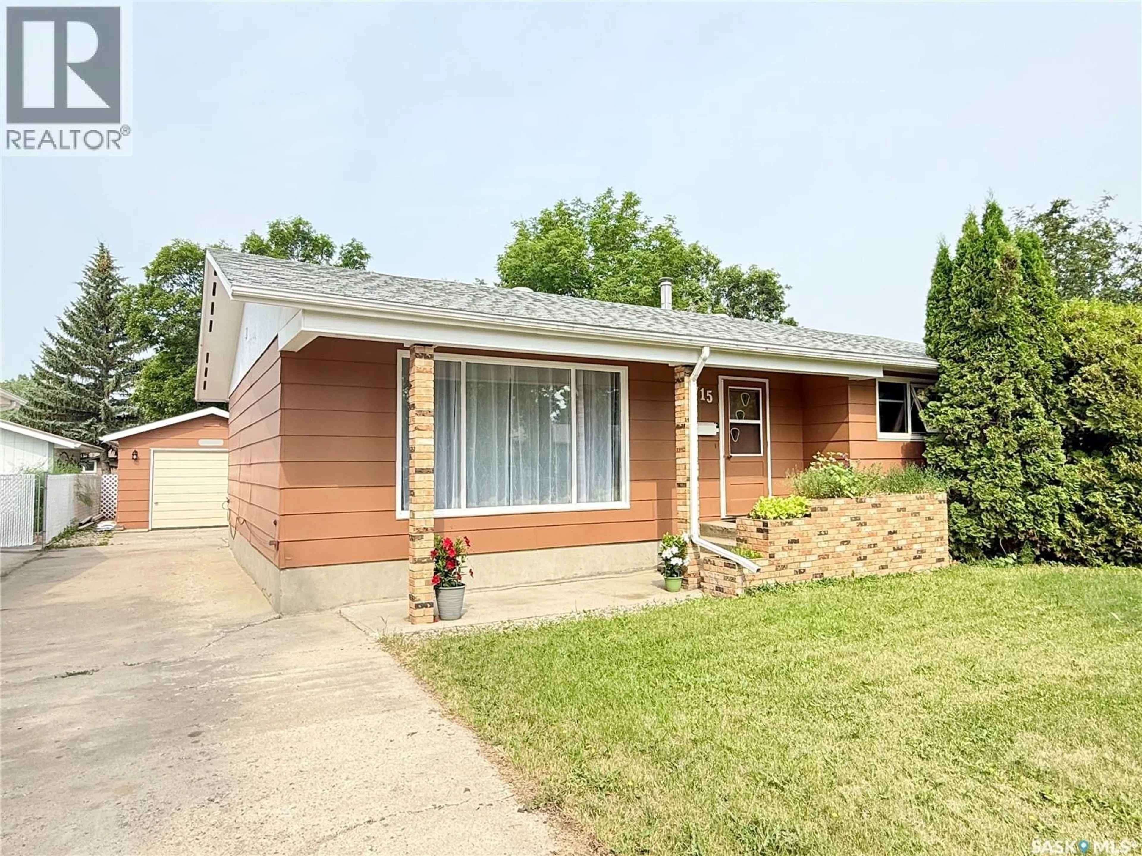 Home with brick exterior material, street for 715 BRIMACOMBE DRIVE, Weyburn Saskatchewan S4H2P7
