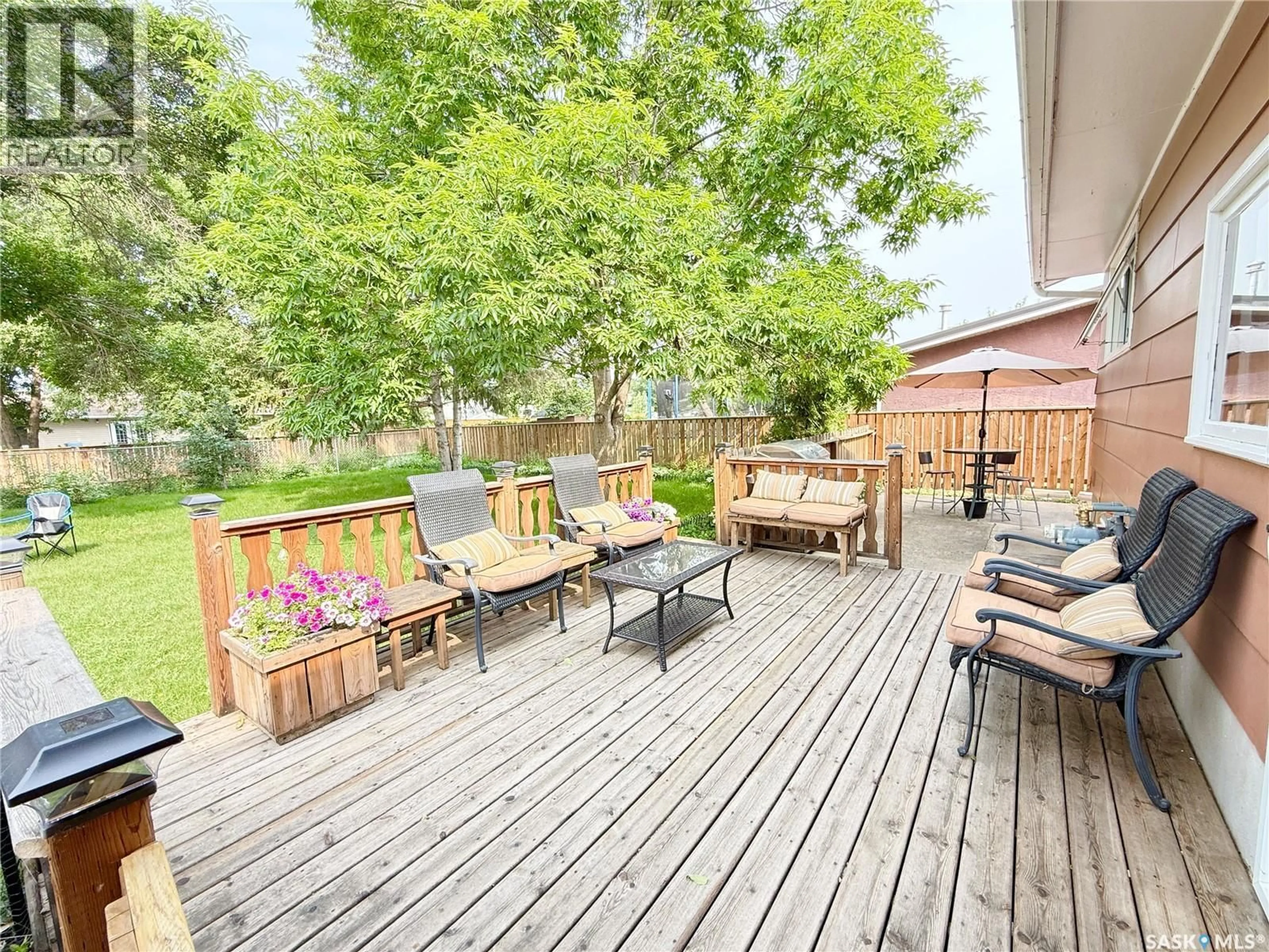 Patio, street for 715 BRIMACOMBE DRIVE, Weyburn Saskatchewan S4H2P7
