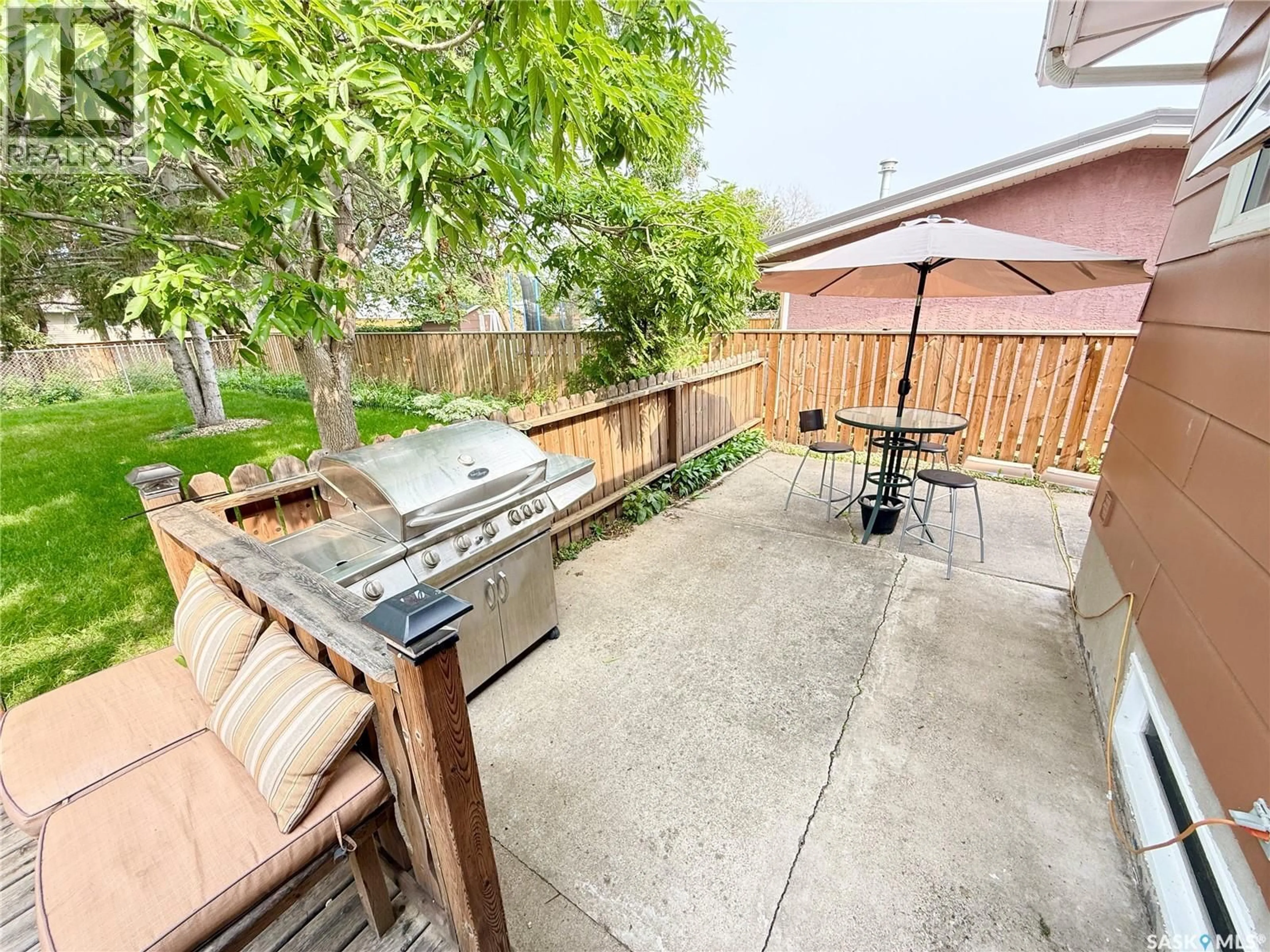 Patio, street for 715 BRIMACOMBE DRIVE, Weyburn Saskatchewan S4H2P7