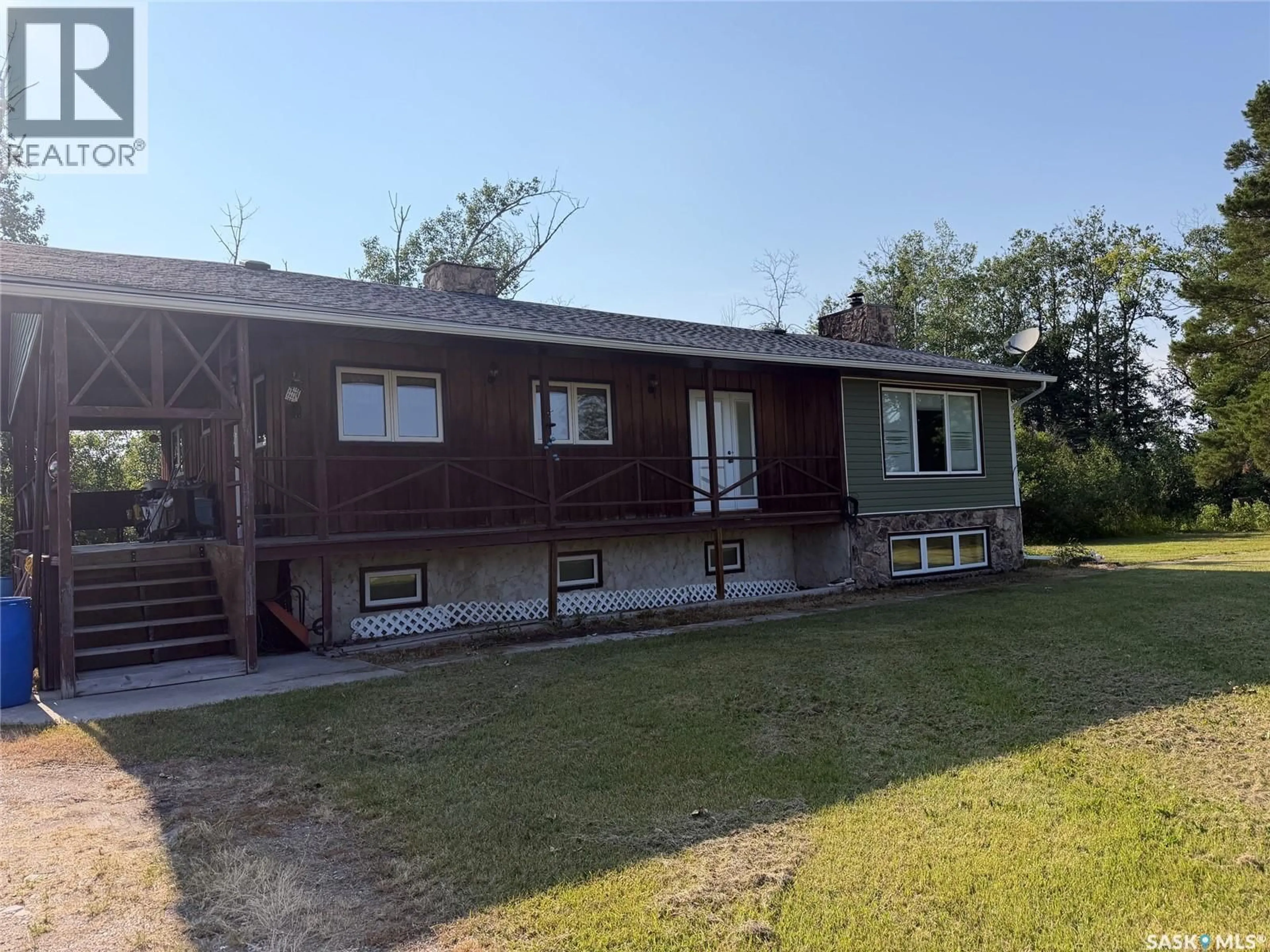 A pic from outside/outdoor area/front of a property/back of a property/a pic from drone, building for MACKIE ACREAGE, Hudson Bay Rm No. 394 Saskatchewan S0E0Y0