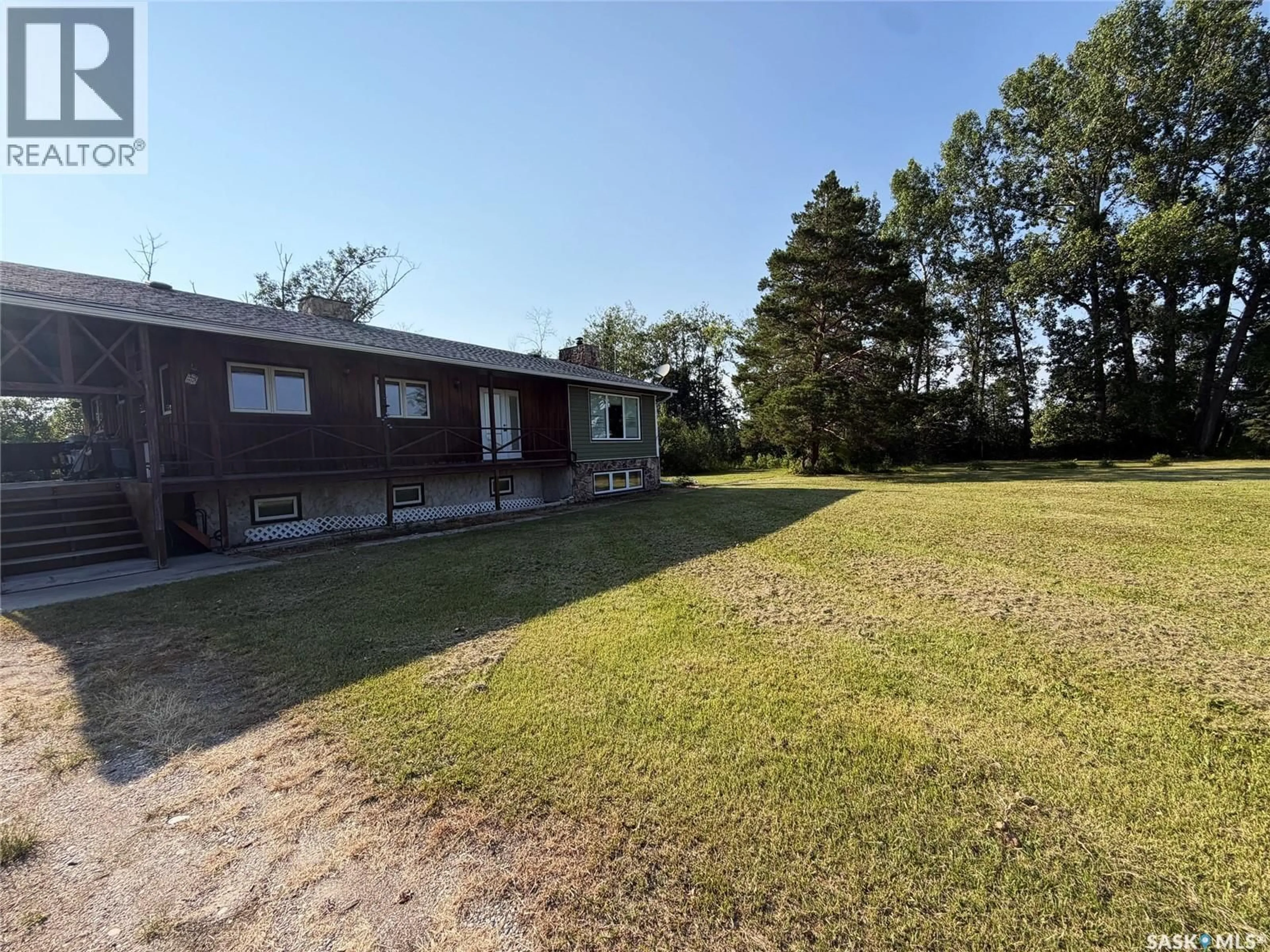 A pic from outside/outdoor area/front of a property/back of a property/a pic from drone, unknown for MACKIE ACREAGE, Hudson Bay Rm No. 394 Saskatchewan S0E0Y0