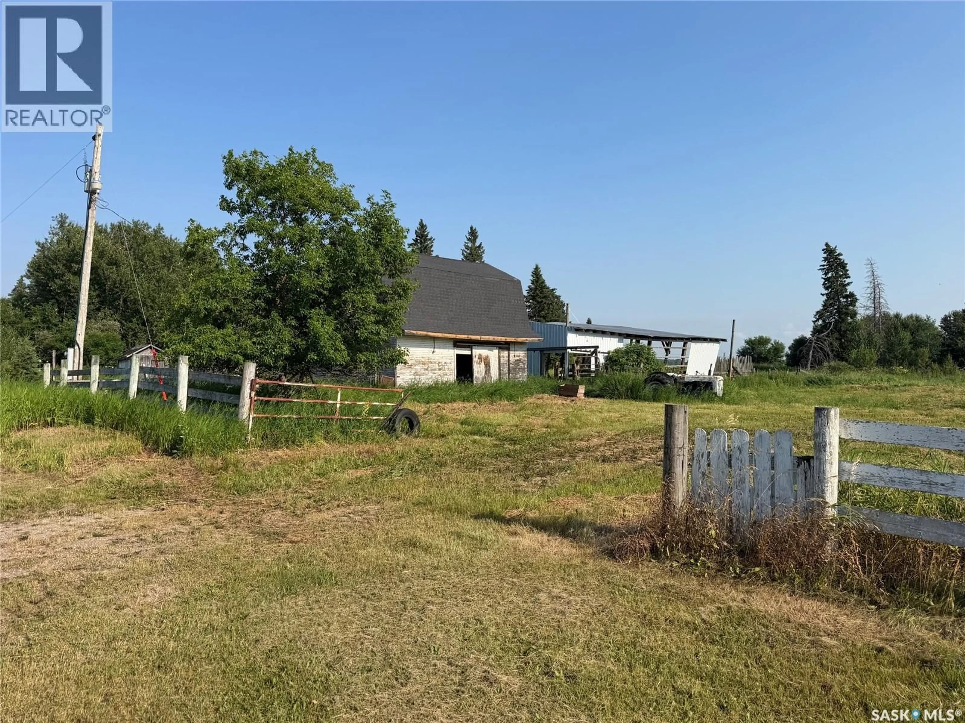 A pic from outside/outdoor area/front of a property/back of a property/a pic from drone, unknown for MACKIE ACREAGE, Hudson Bay Rm No. 394 Saskatchewan S0E0Y0