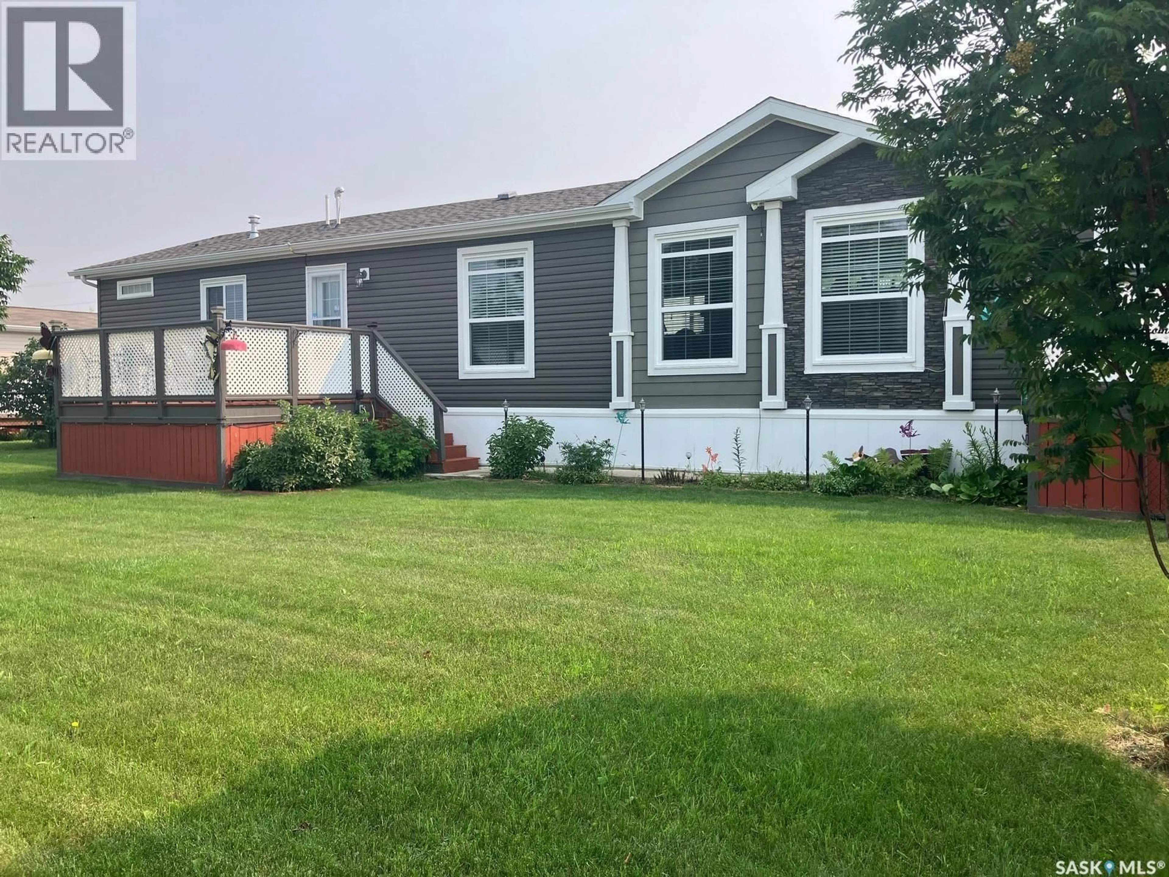 Home with vinyl exterior material, unknown for 1205 3RD STREET, Nipawin Saskatchewan S0E1E0