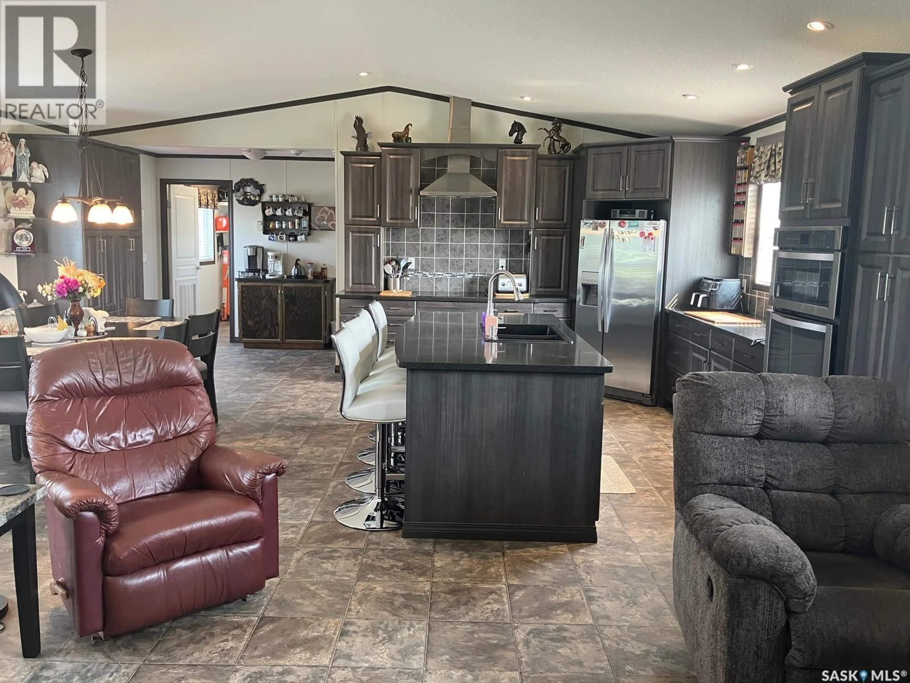 Open concept kitchen, ceramic/tile floor for 1205 3RD STREET, Nipawin Saskatchewan S0E1E0