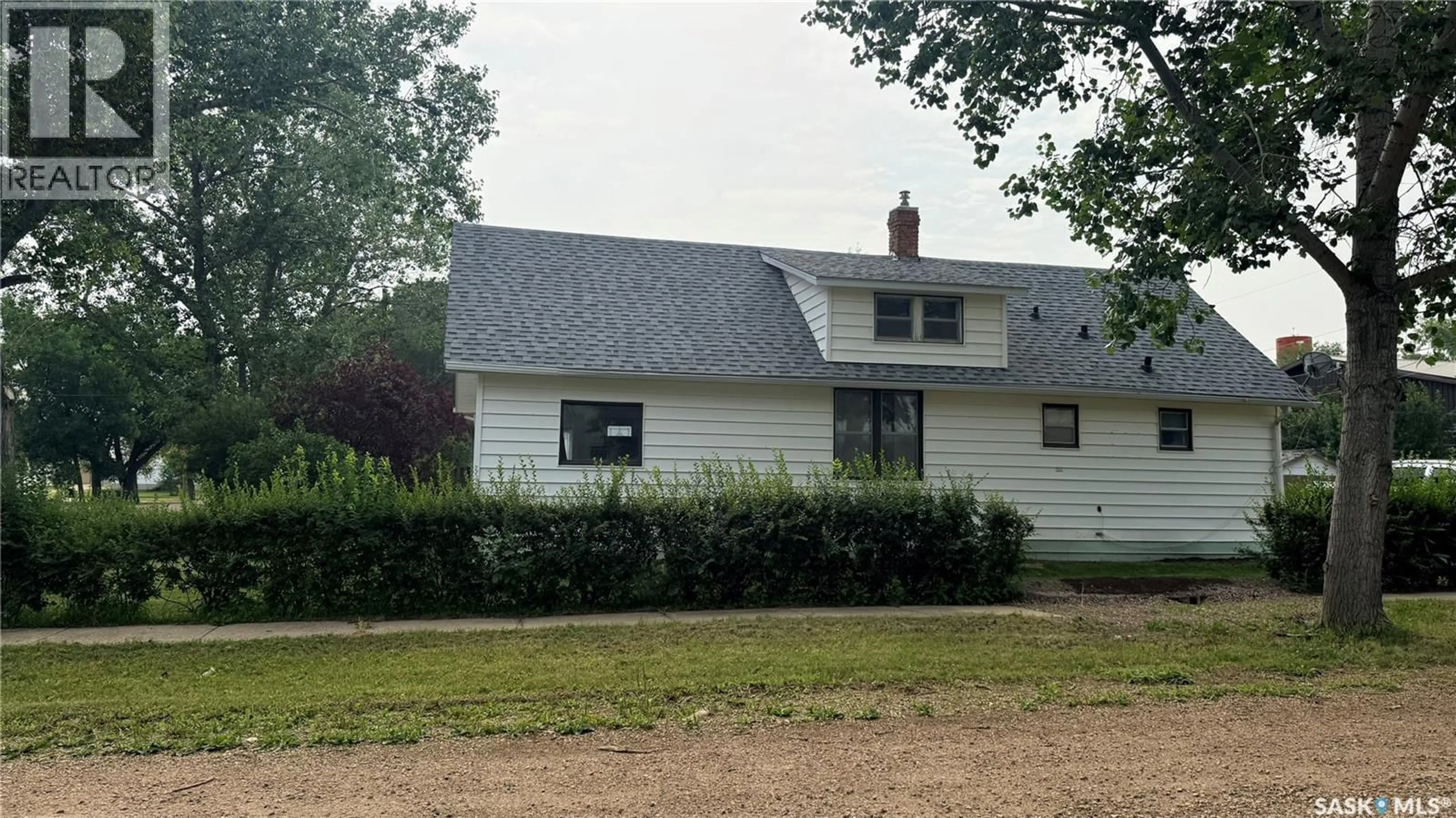 Home with vinyl exterior material, street for 402 SASKATCHEWAN AVENUE, Torquay Saskatchewan S0C2L0