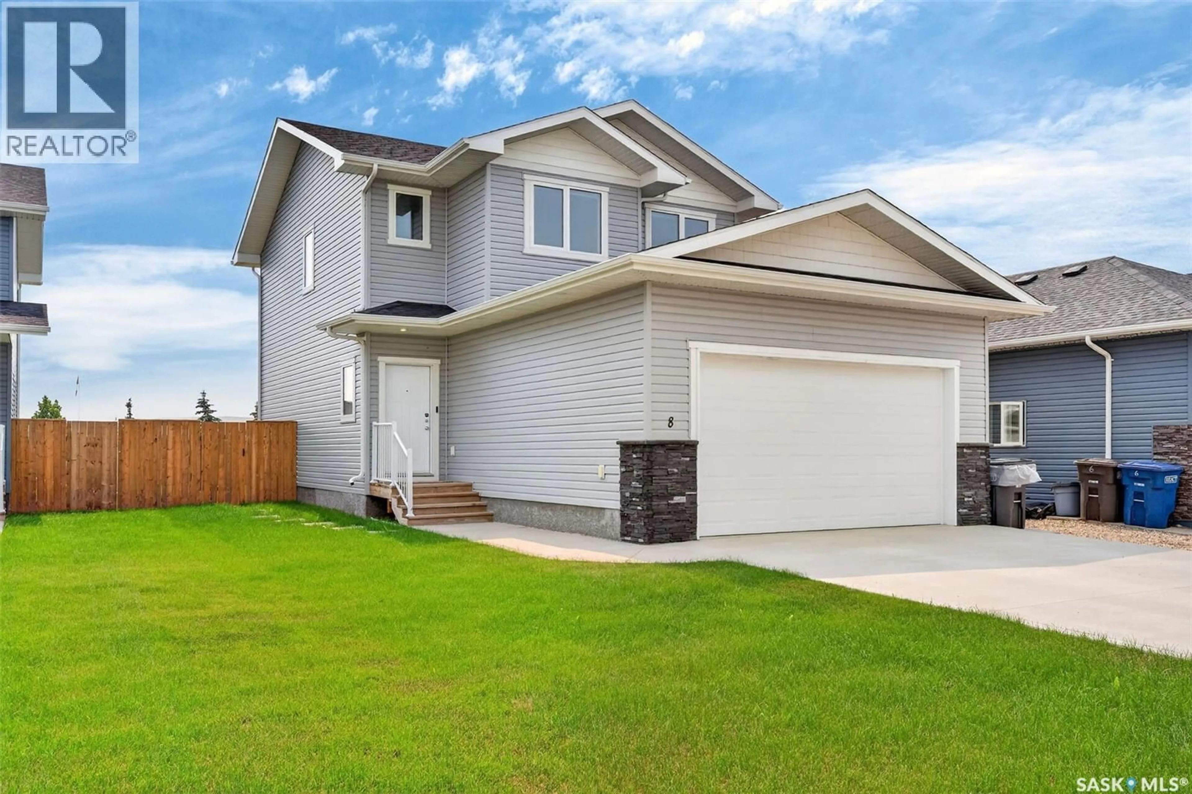 Home with vinyl exterior material, street for 8 ASPEN PLACE, Humboldt Saskatchewan S0K2A0