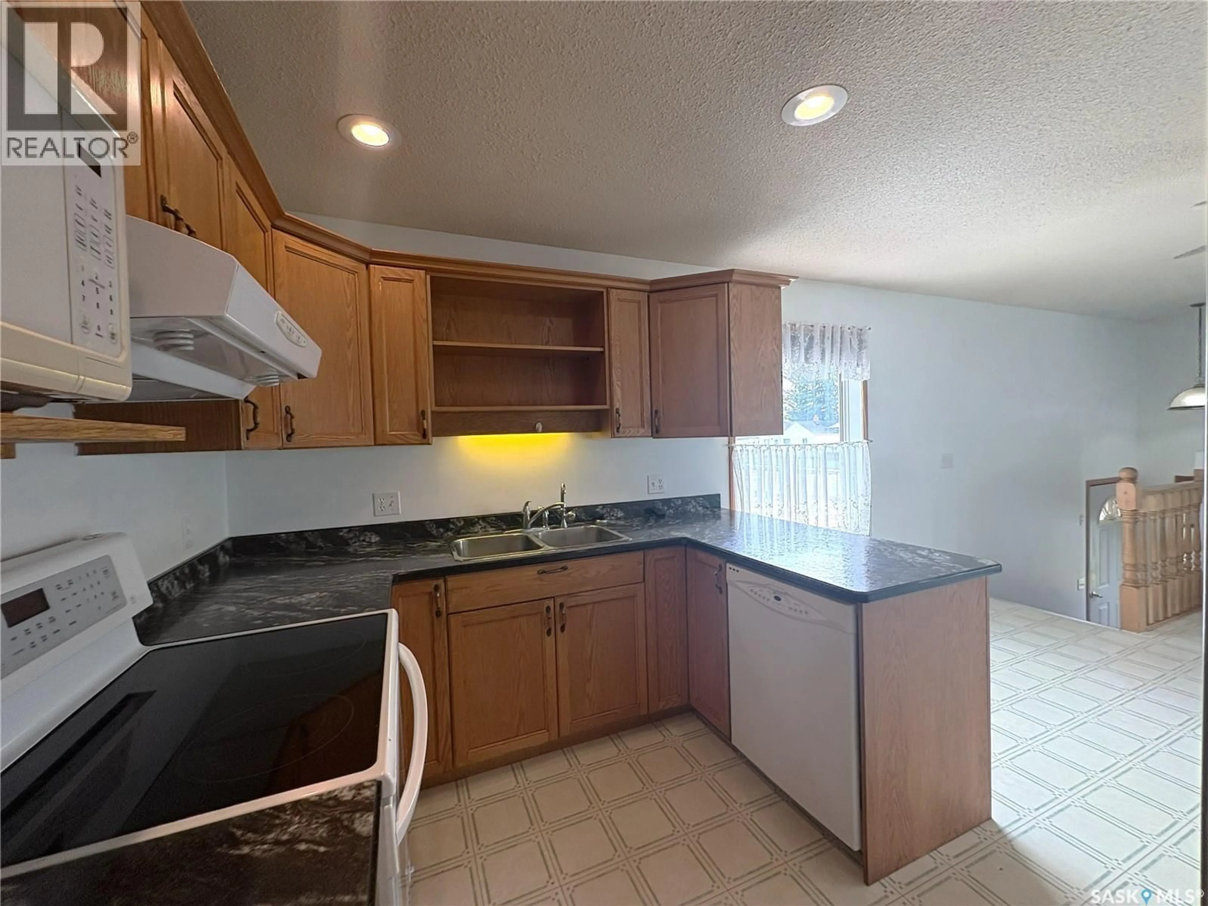 Standard kitchen, ceramic/tile floor for 728 14TH STREET, Humboldt Saskatchewan S0K2A0