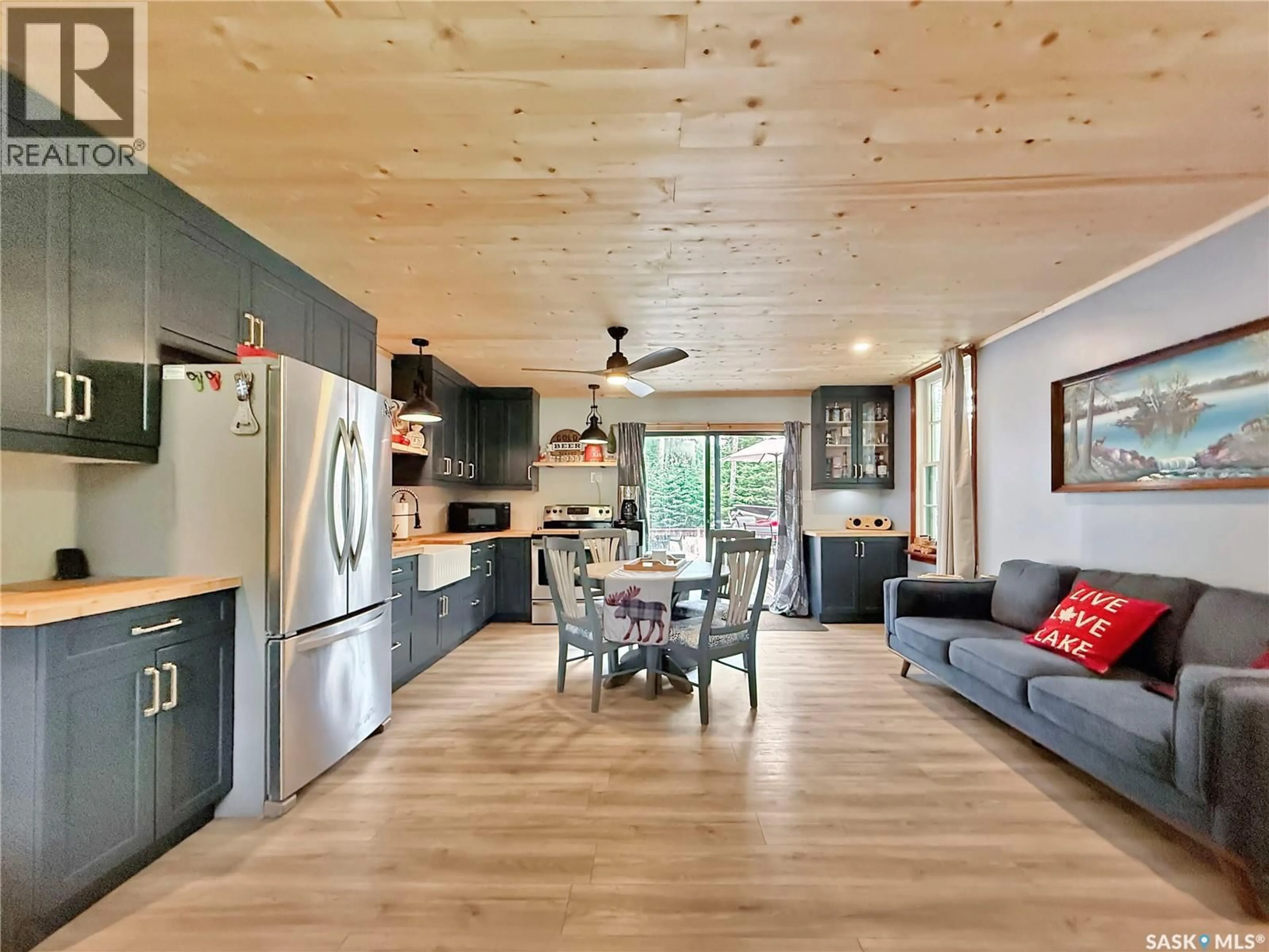 Open concept kitchen, wood/laminate floor for 16 HAYES DRIVE, Candle Lake Saskatchewan S0J3E0