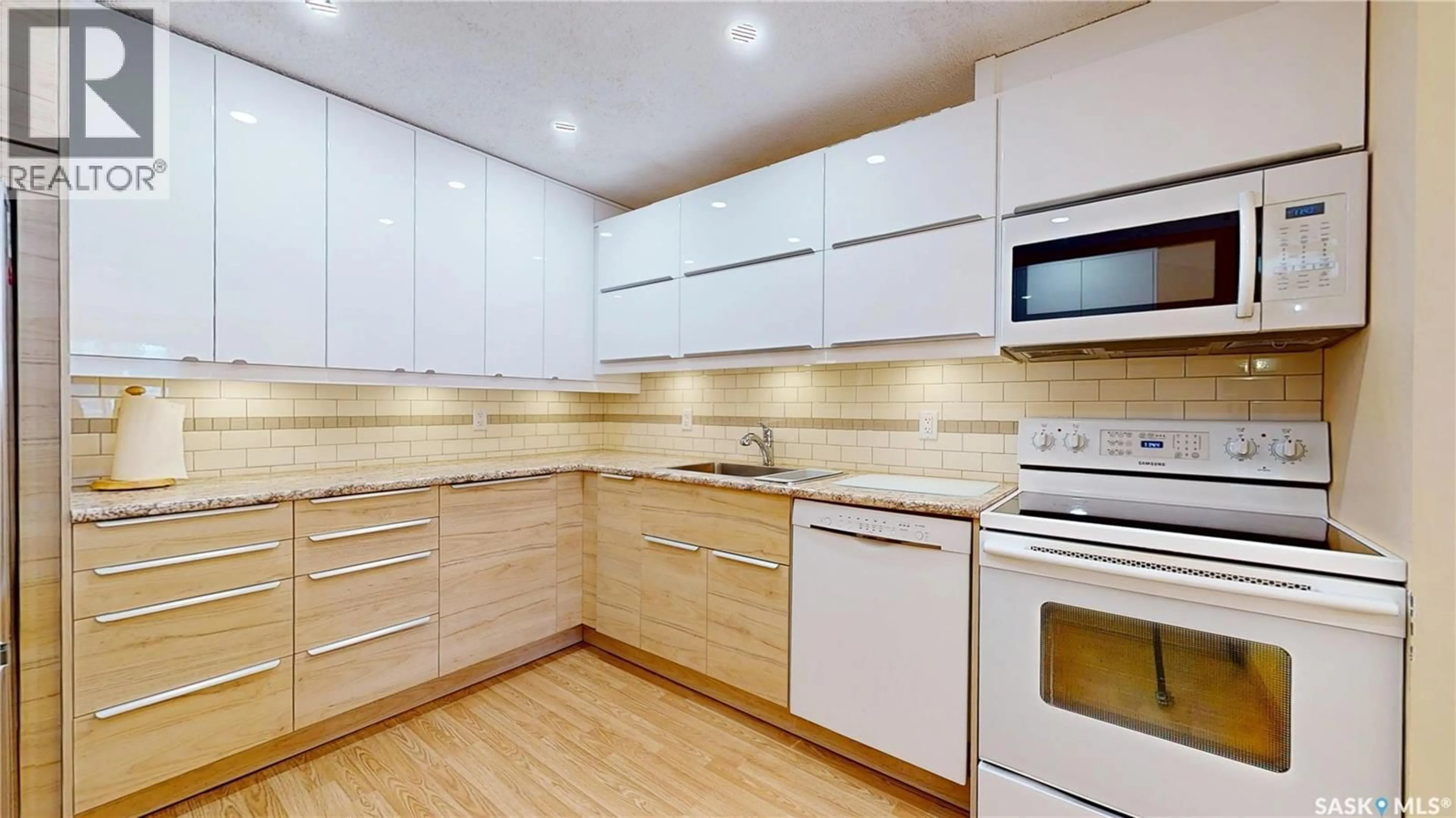 Standard kitchen, wood/laminate floor for 107 - 2727 VICTORIA AVENUE, Regina Saskatchewan S4T1K4