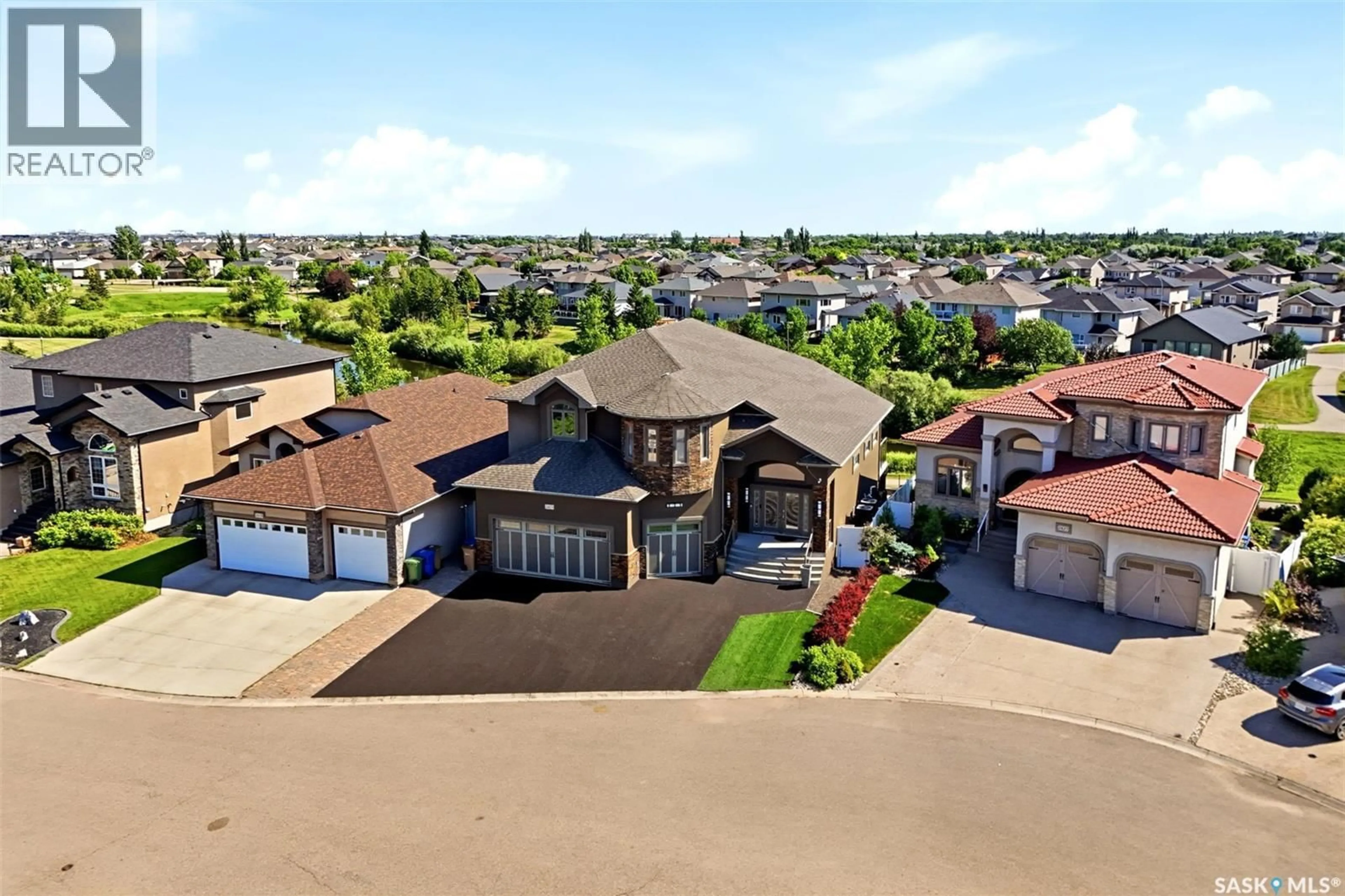 A pic from outside/outdoor area/front of a property/back of a property/a pic from drone, street for 2423 LINNER BAY, Regina Saskatchewan S4V1K3