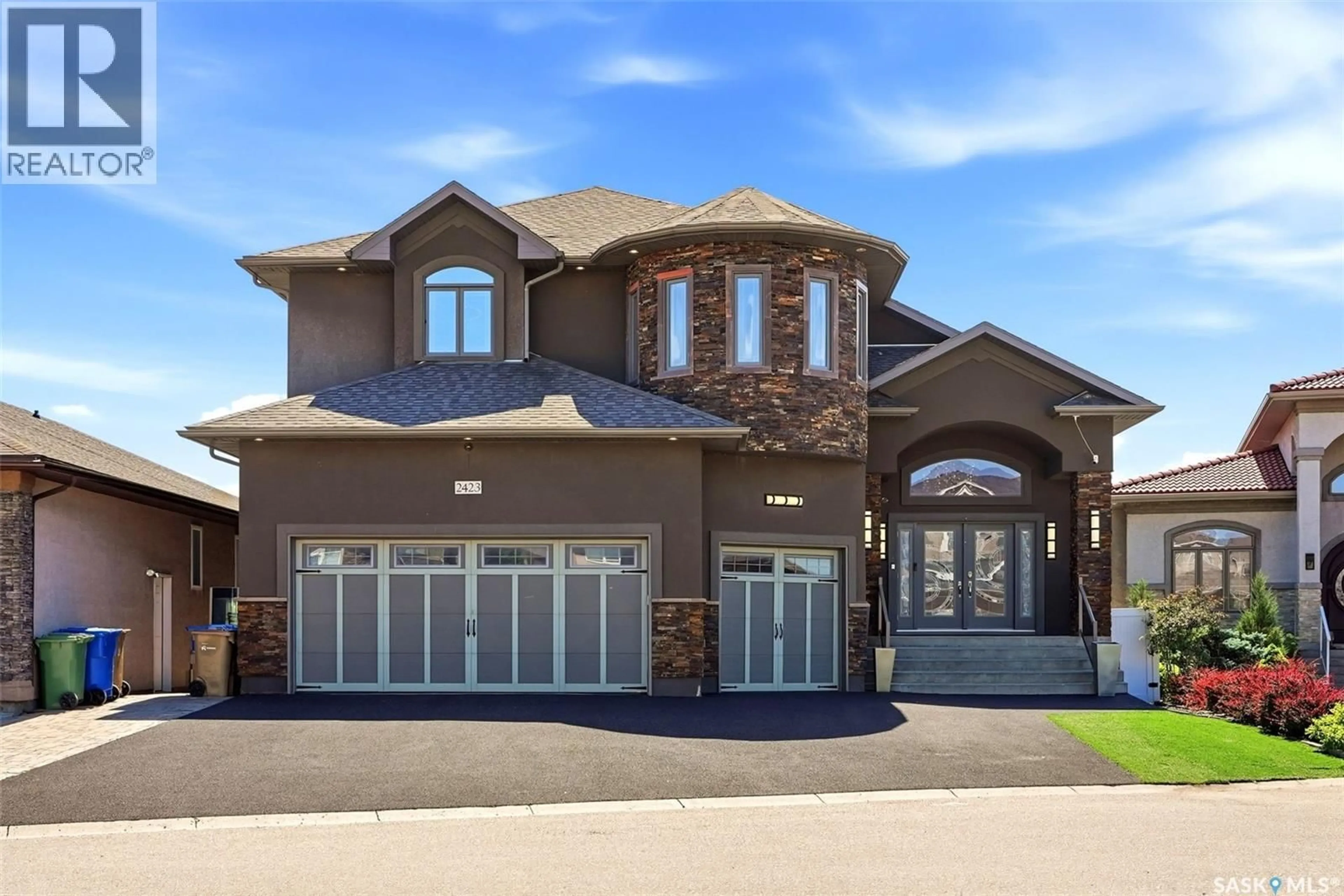 Home with brick exterior material, street for 2423 LINNER BAY, Regina Saskatchewan S4V1K3