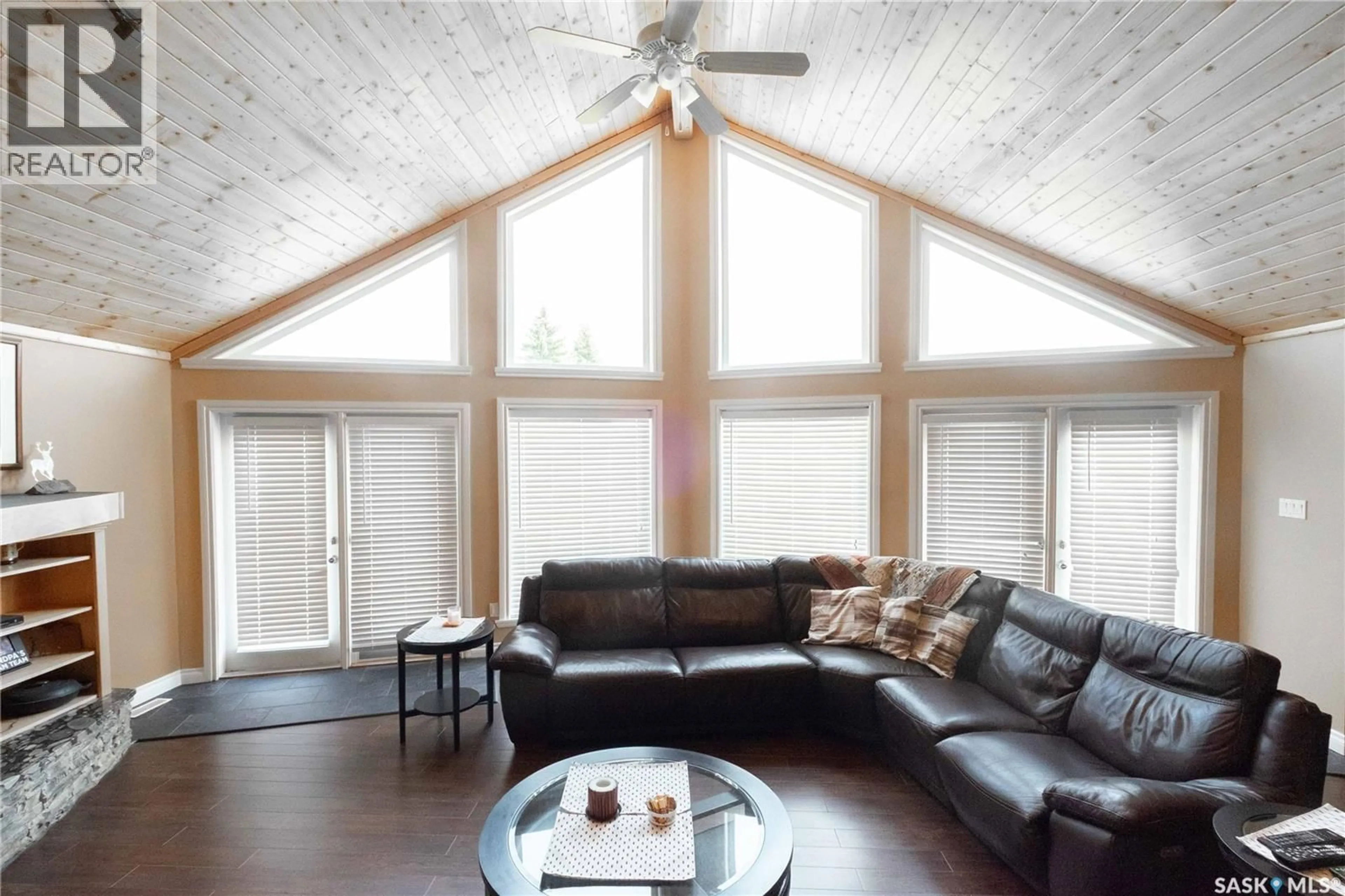 Living room with furniture, wood/laminate floor for 49 TAYLOR STREET, Katepwa Beach Saskatchewan S0G2Y0
