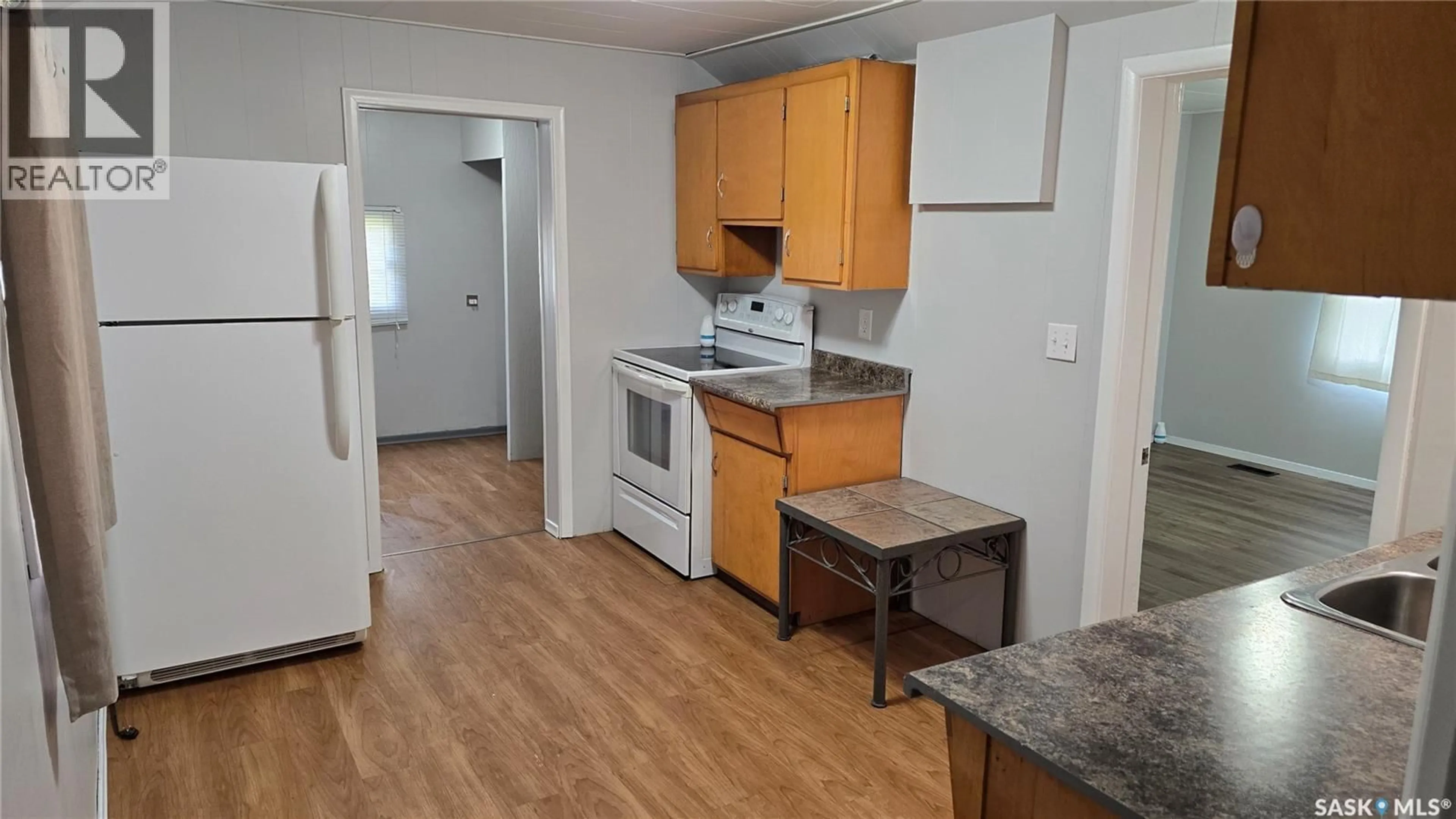 Standard kitchen, wood/laminate floor for 206 IRVINE STREET, Cut Knife Saskatchewan S0M0N0