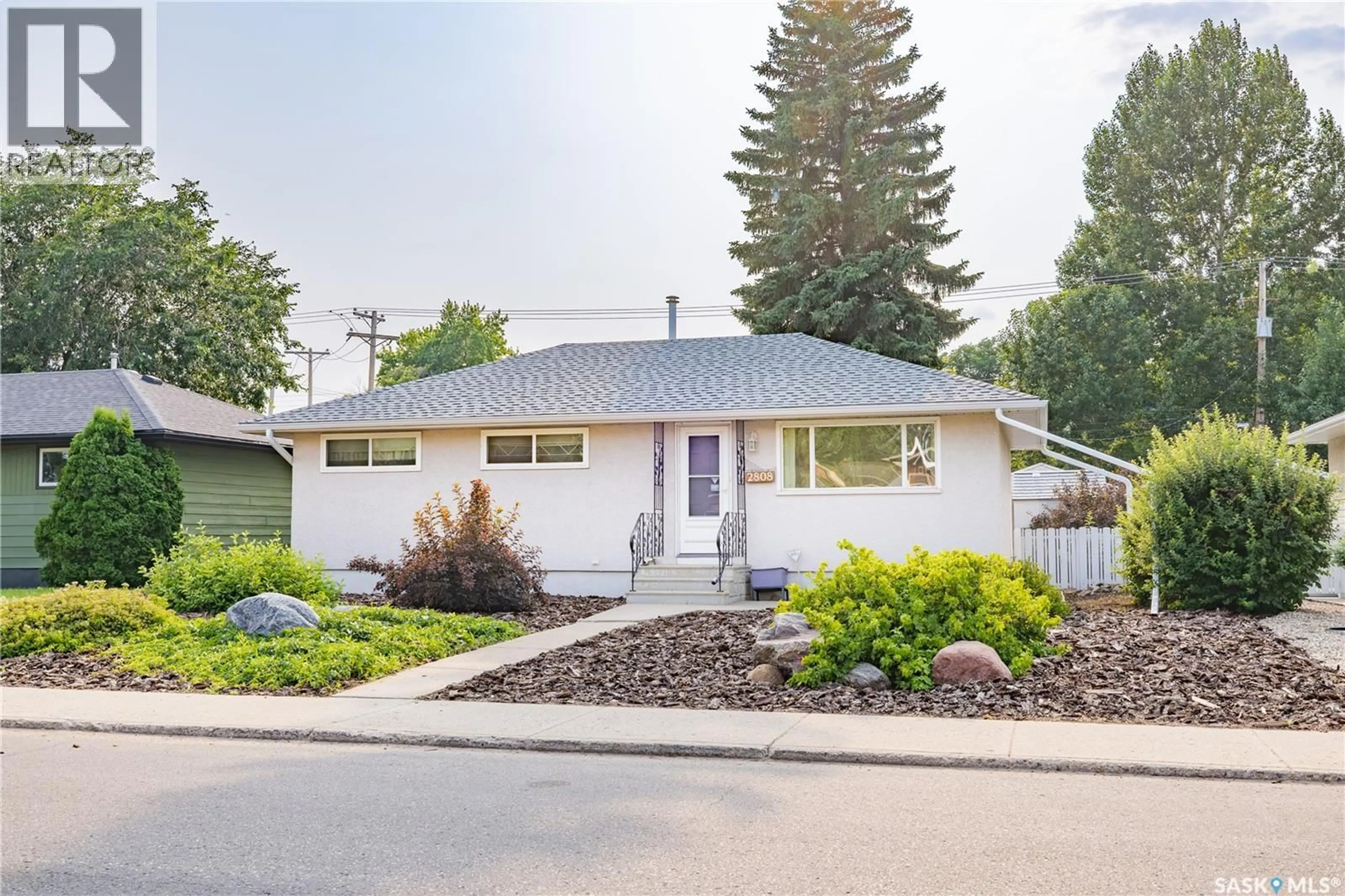 Home with vinyl exterior material, street for 2808 CLARENCE AVENUE, Saskatoon Saskatchewan S7J1M8