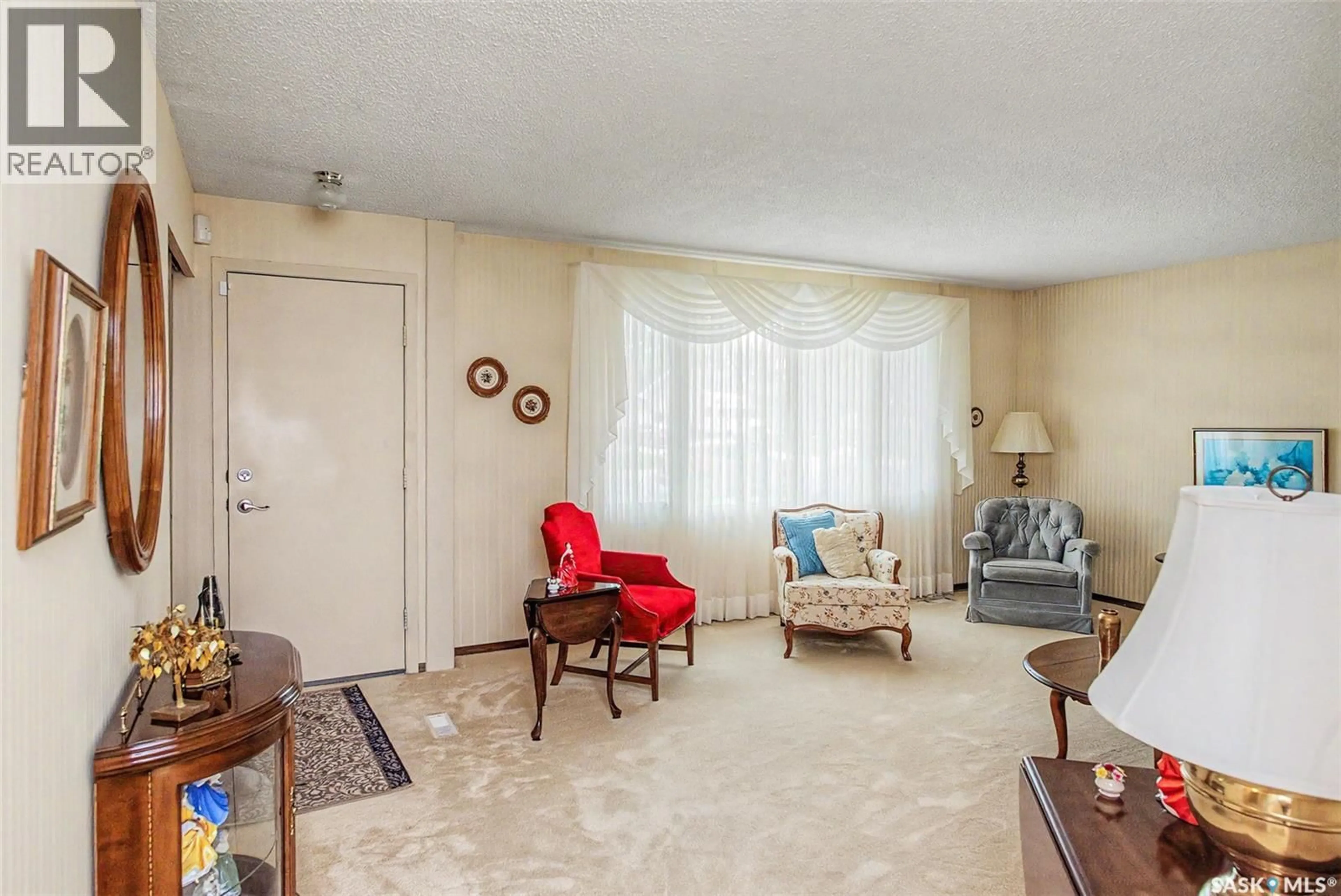 Living room with furniture, unknown for 140 MCDOUGALL CRESCENT, Regina Saskatchewan S4S5M7