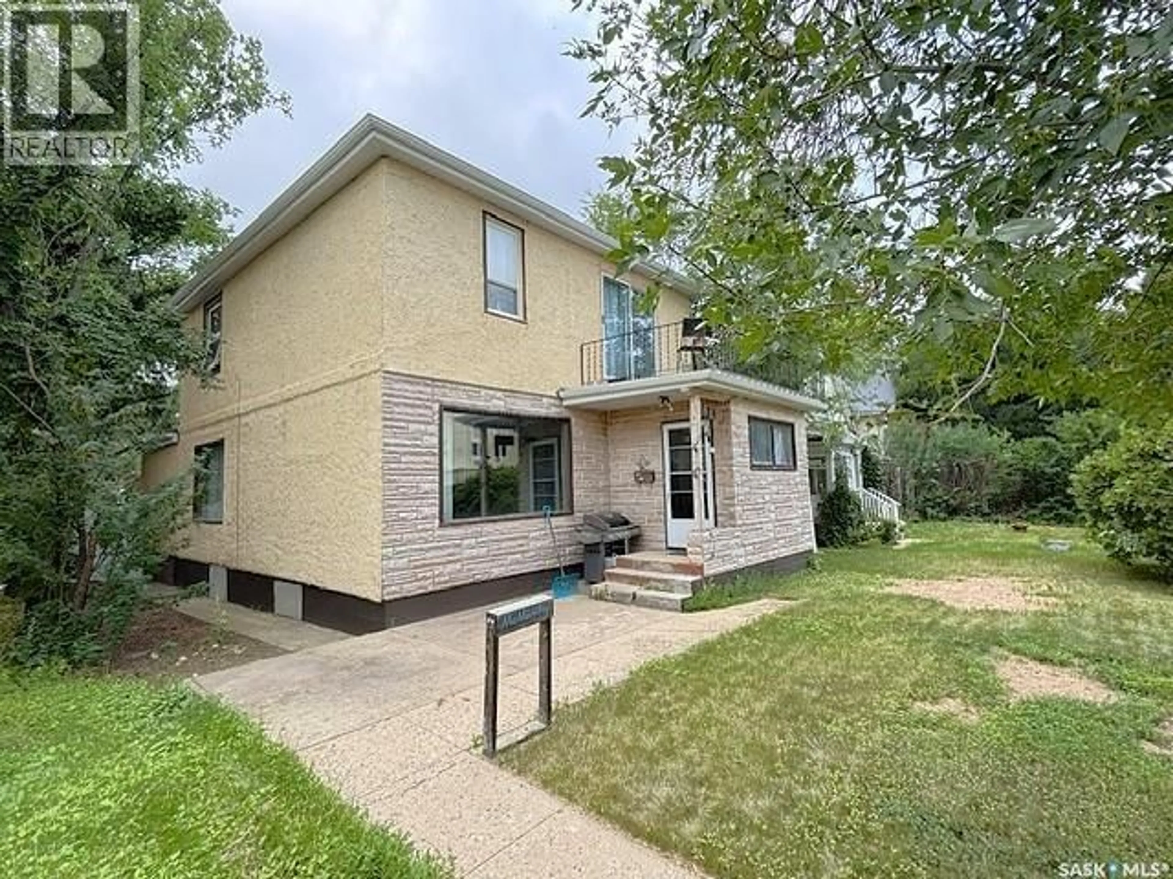 Home with brick exterior material, street for 347 OMINICA STREET, Moose Jaw Saskatchewan S6H1X6