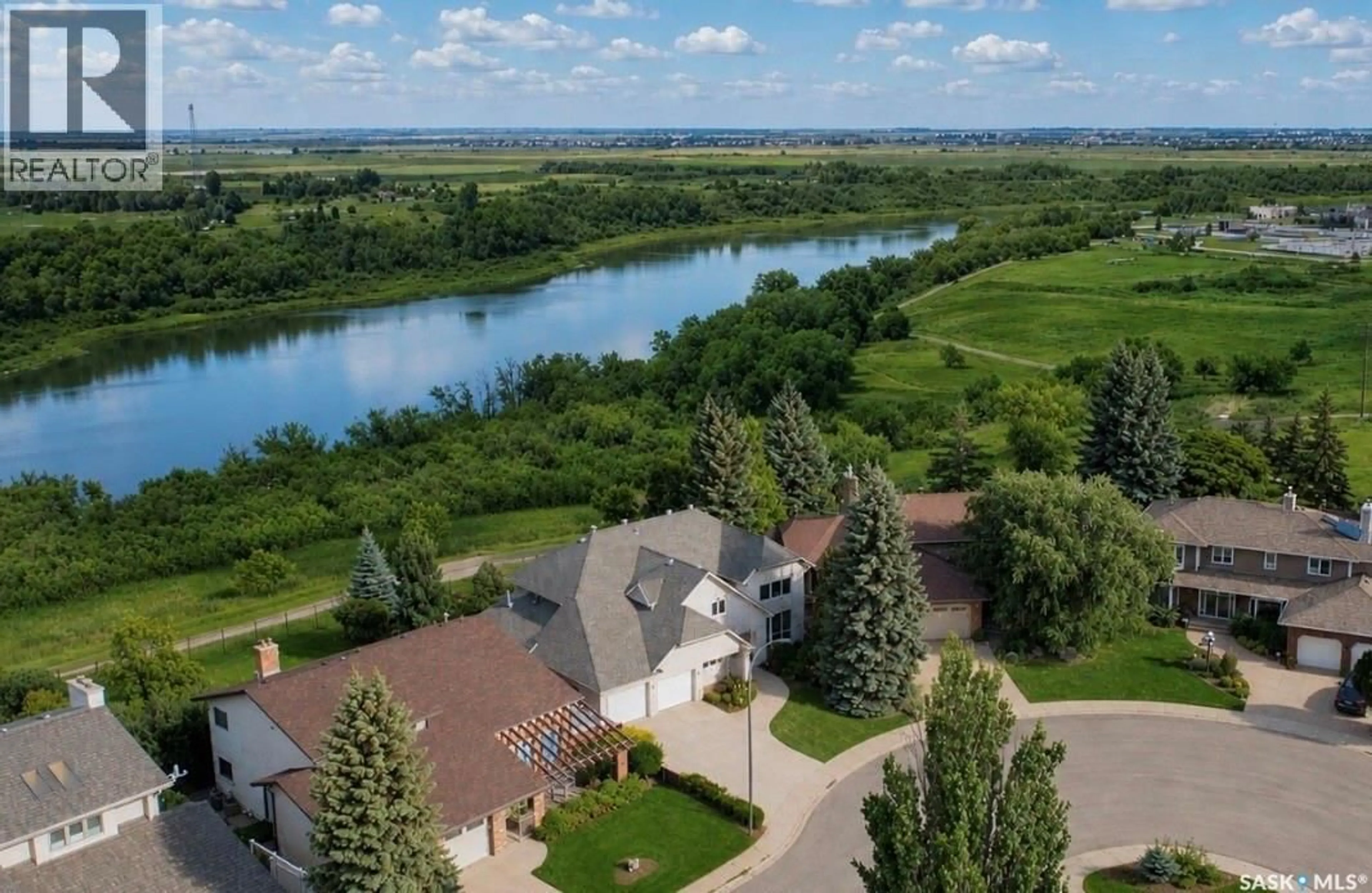 A pic from outside/outdoor area/front of a property/back of a property/a pic from drone, water/lake/river/ocean view for 323 MALLIN CRESCENT, Saskatoon Saskatchewan S7K7X2