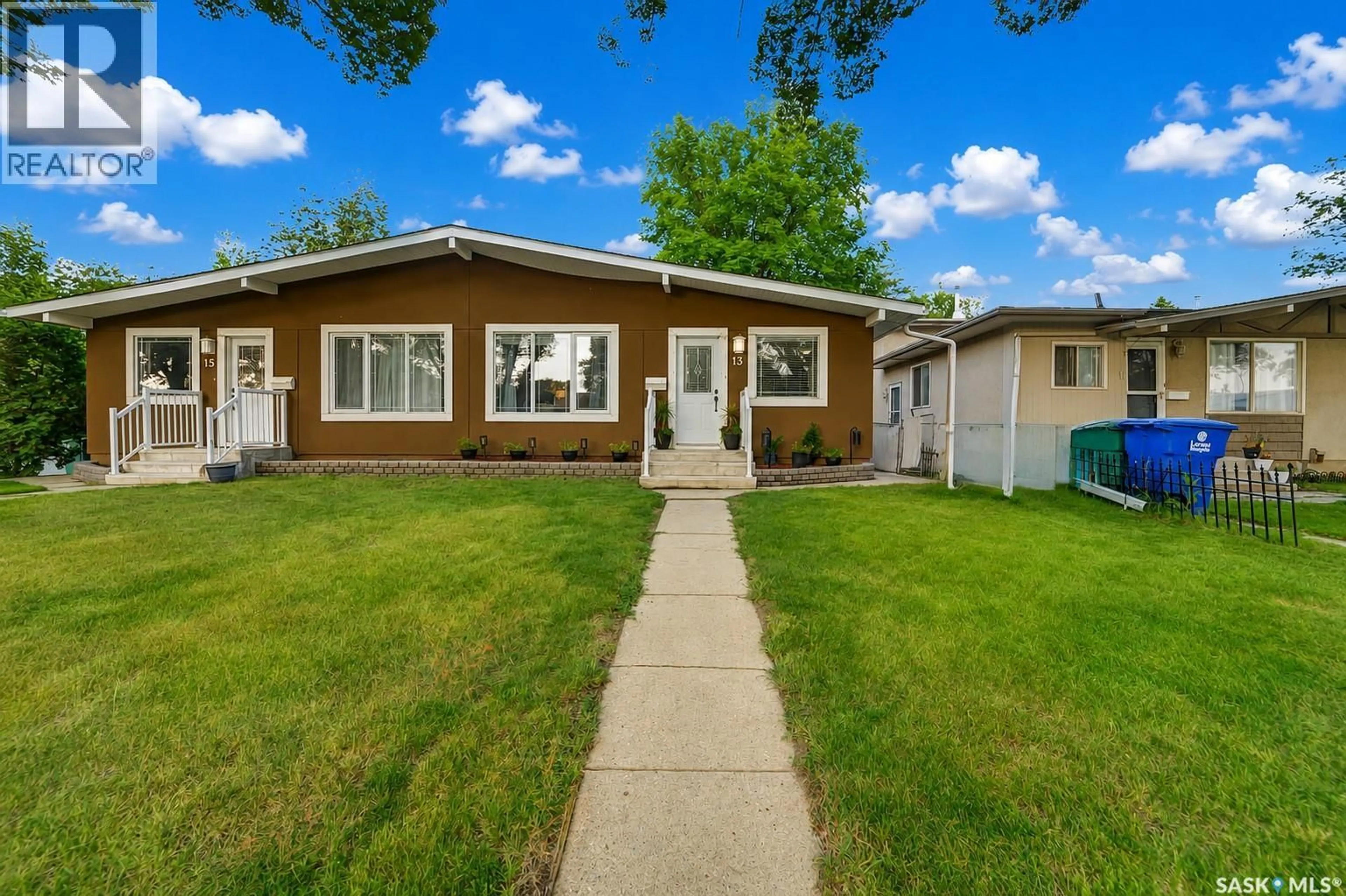 Home with vinyl exterior material, street for 13 CARLETON DRIVE, Saskatoon Saskatchewan S7H3N7