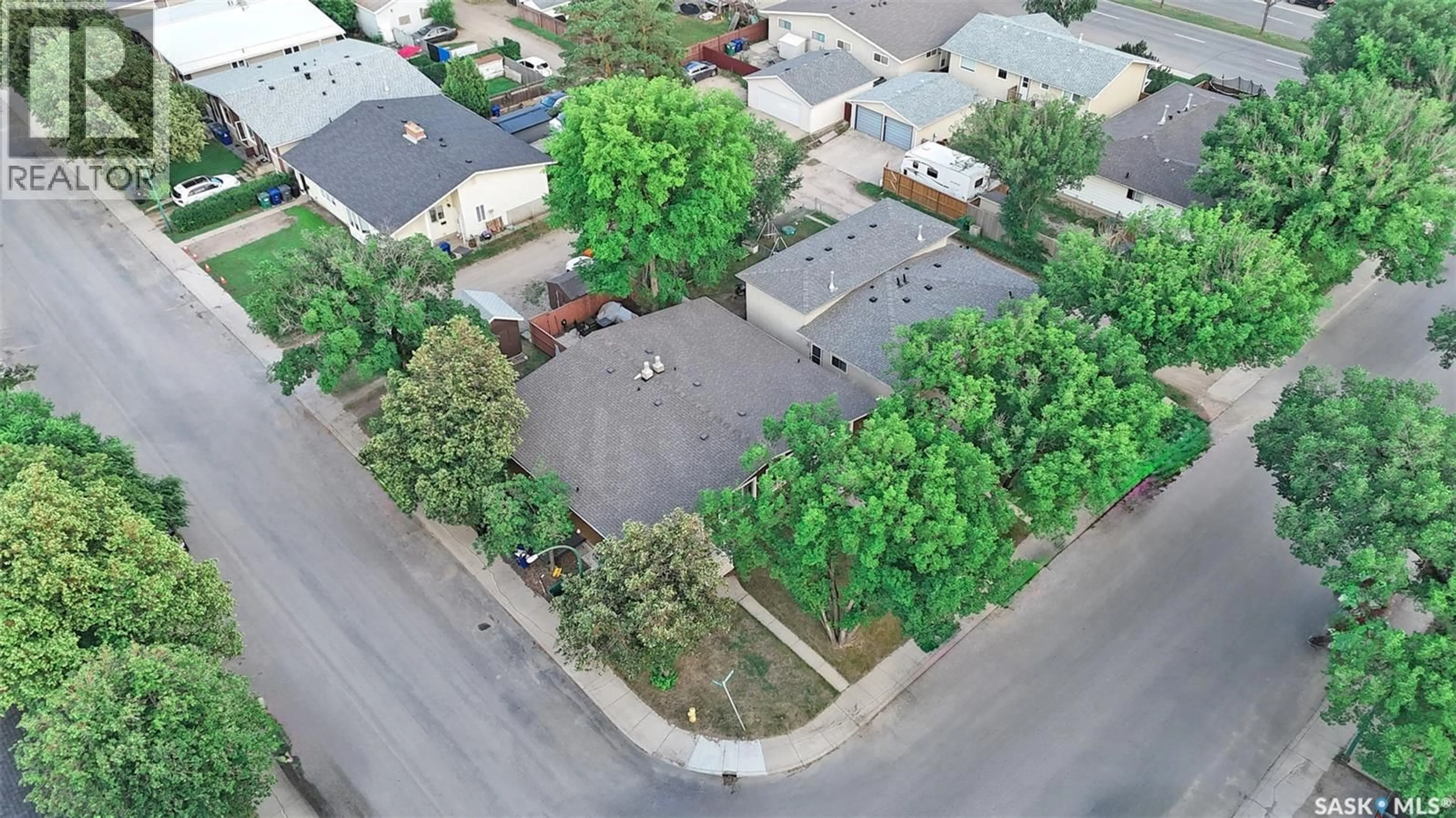 A pic from outside/outdoor area/front of a property/back of a property/a pic from drone, street for 13 CARLETON DRIVE, Saskatoon Saskatchewan S7H3N7