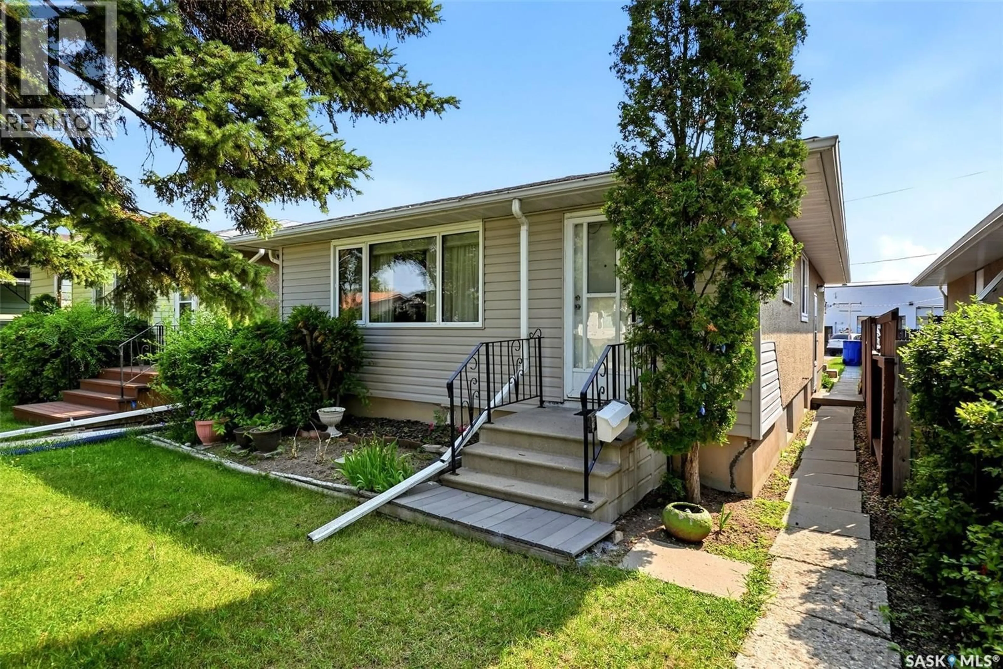 Home with vinyl exterior material, street for 273 ANGUS STREET, Regina Saskatchewan S4R3K5