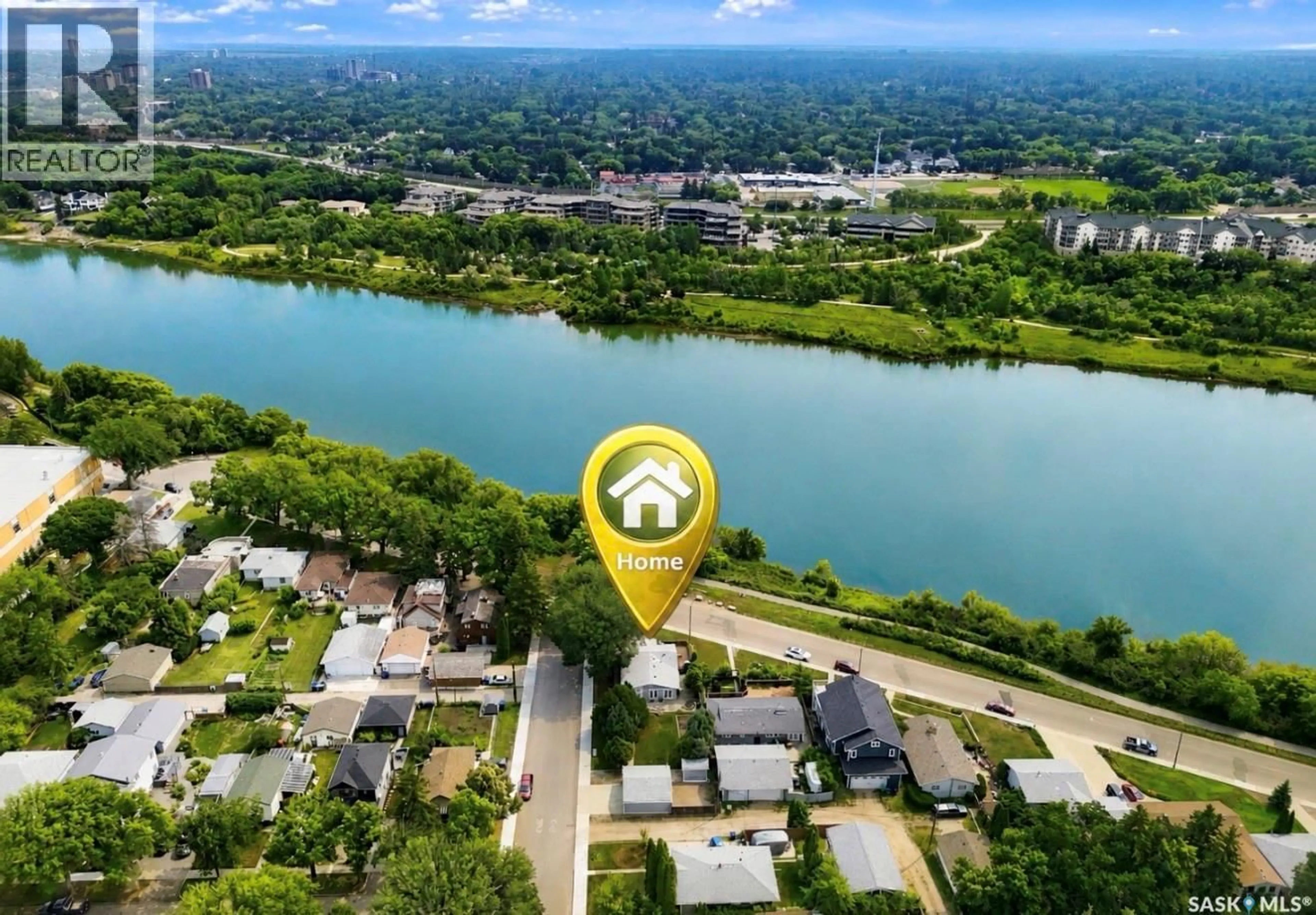 A pic from outside/outdoor area/front of a property/back of a property/a pic from drone, water/lake/river/ocean view for 1201 SPADINA CRESCENT, Saskatoon Saskatchewan S7M1P4