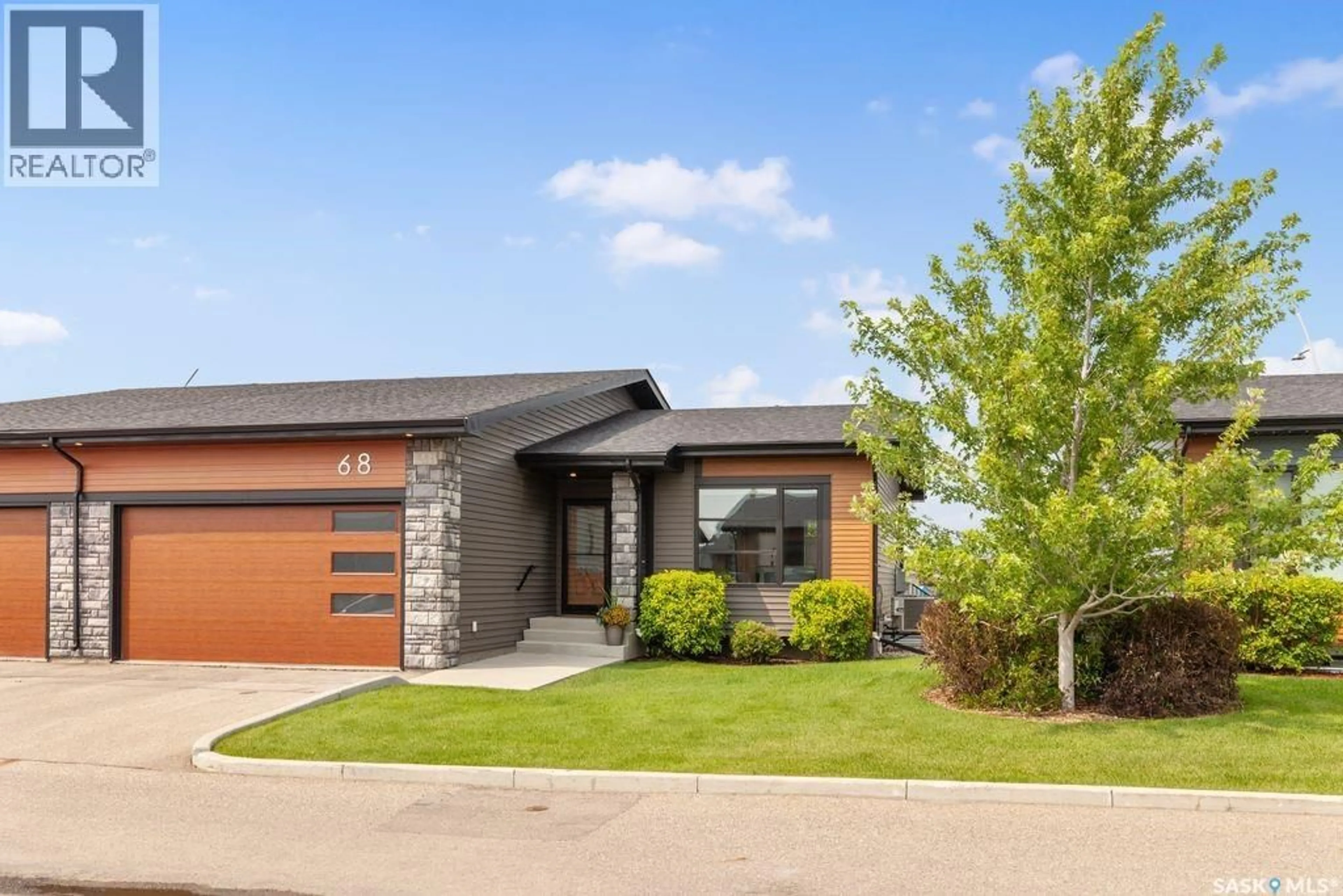 Home with brick exterior material, street for 103 - 68 POHORECKY CRESCENT, Saskatoon Saskatchewan S7W0X7