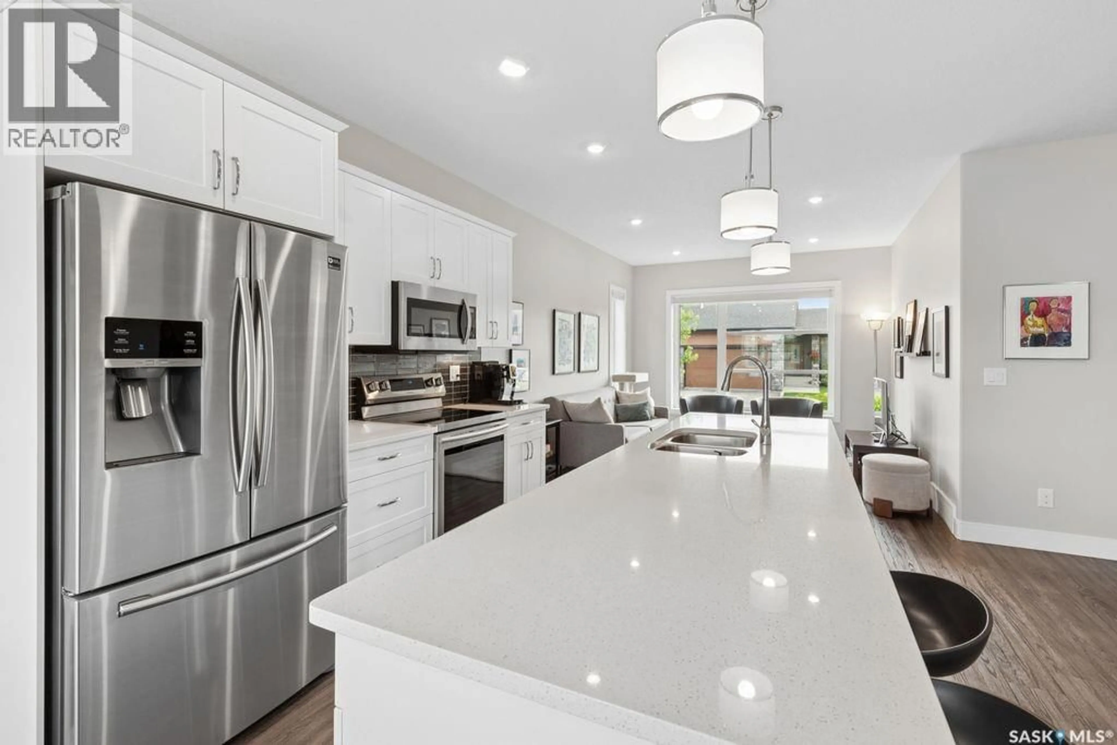 Open concept kitchen, ceramic/tile floor for 103 - 68 POHORECKY CRESCENT, Saskatoon Saskatchewan S7W0X7