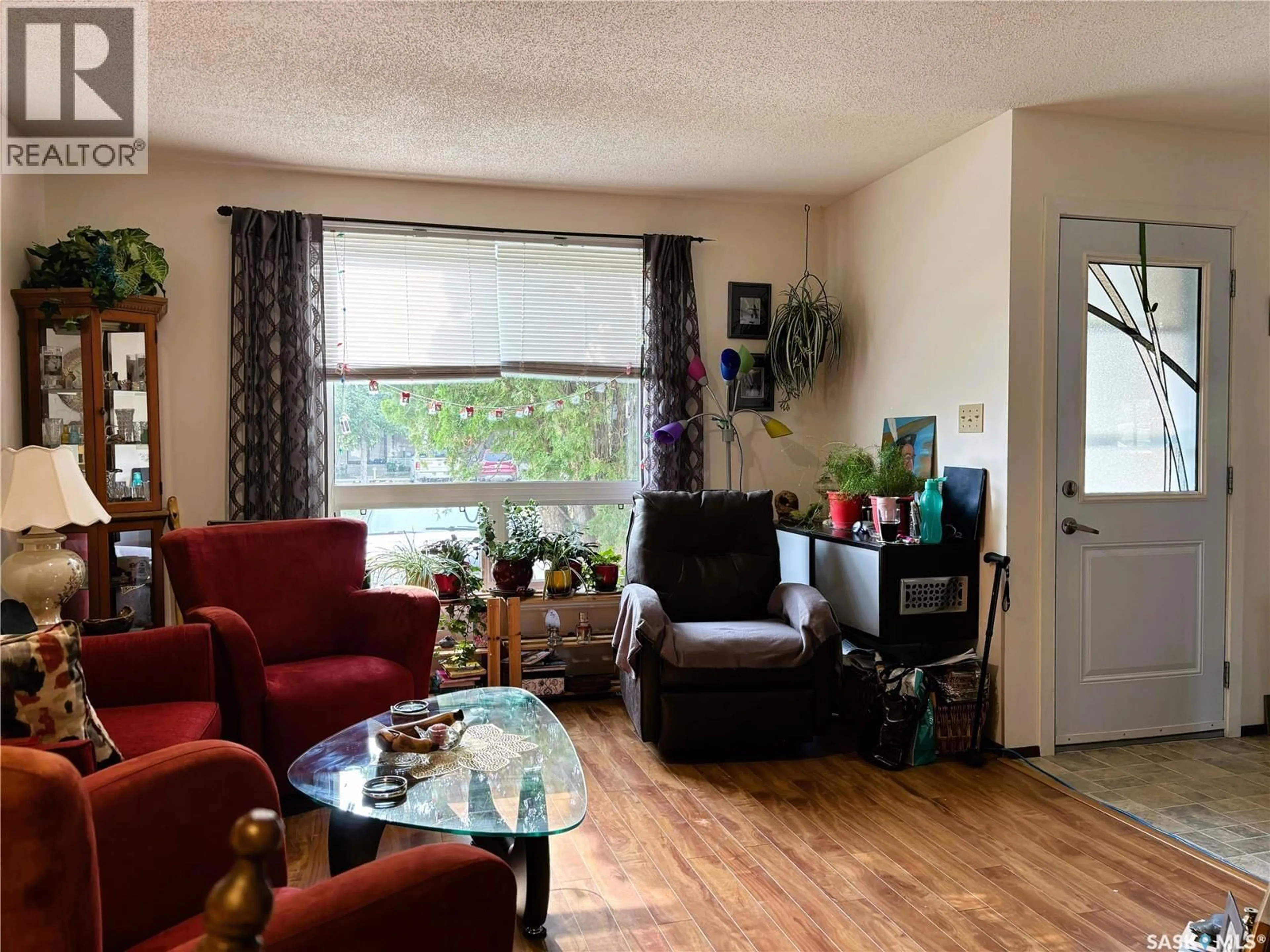 Living room with furniture, unknown for 1128 - 127 MCKERCHER DRIVE, Saskatoon Saskatchewan S7H4Y7