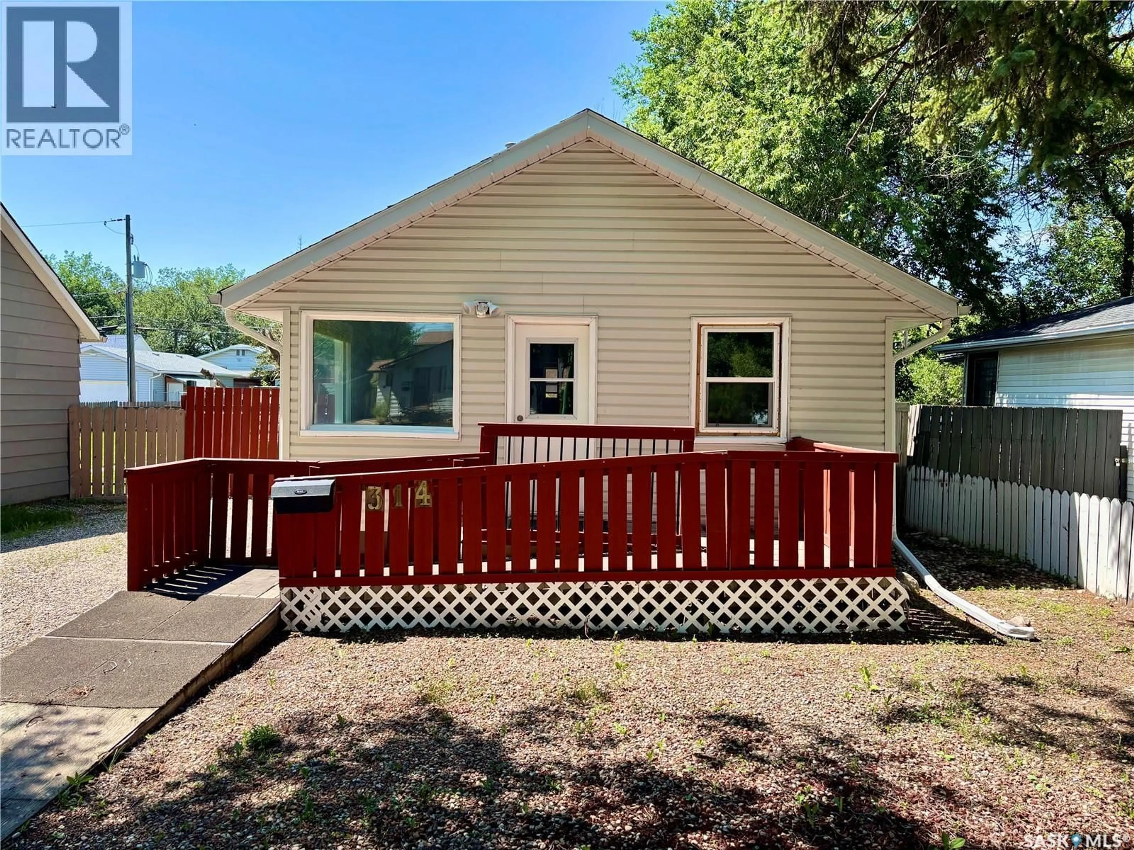 Home with vinyl exterior material, street for 314 RETALLACK STREET, Regina Saskatchewan S4R3N2