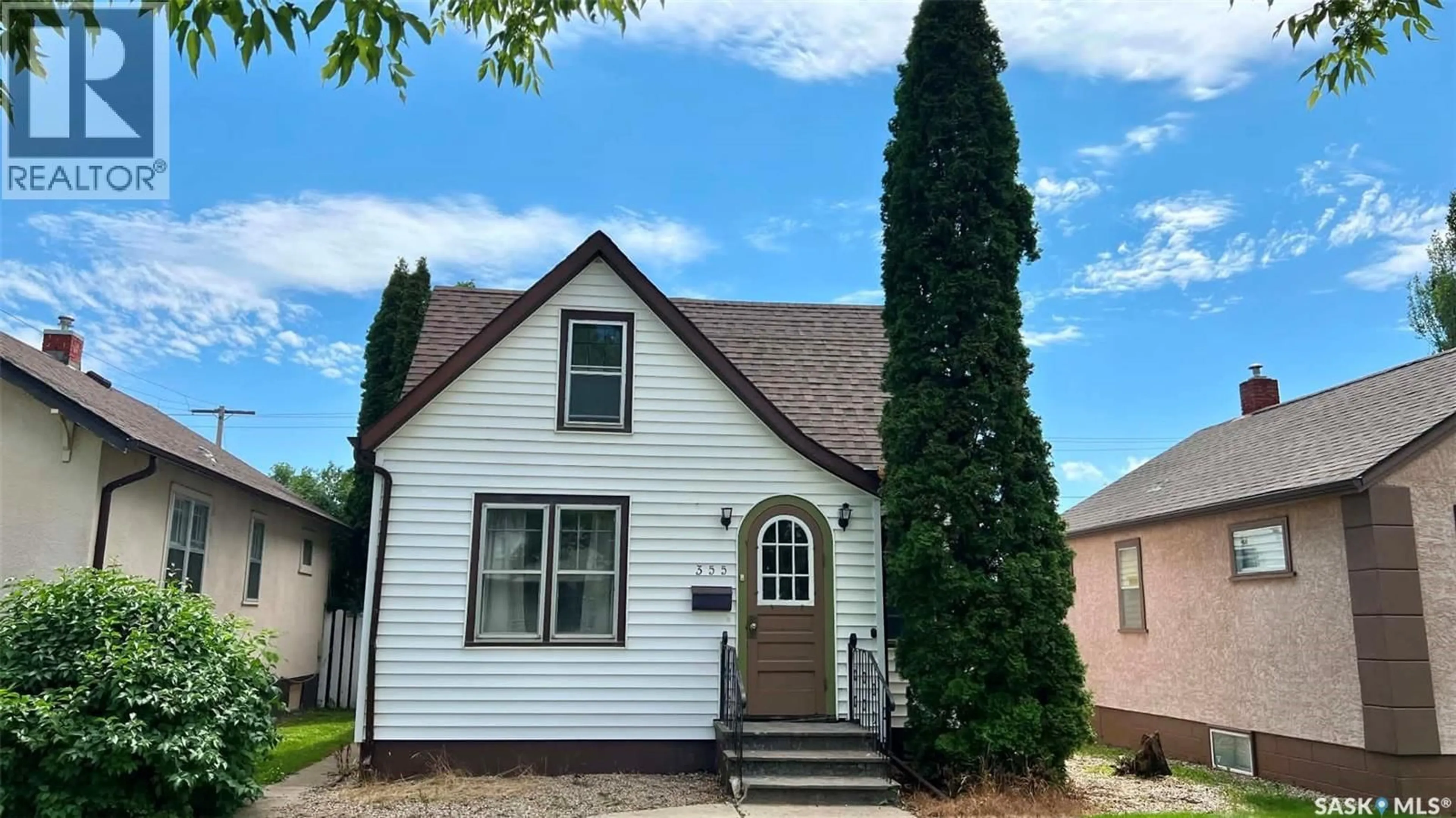 Home with vinyl exterior material, street for 355 10TH STREET, Prince Albert Saskatchewan S6V0Z2